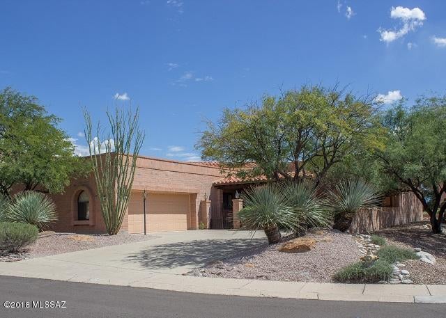 This home is beautiful, large and has spectacular mountain views. The garage is nicely set to the left of the porch and driveway, giving the front of the house the spotlight it deserves. The porch is gated for privacy and has room for a nice swing chair or patio table for morning coffee. As you enter the home, all the bedrooms are to the right of the home. The first room to the right is the den with tons of storage and a built in desk ready for use. The master bedroom is large and has its own door to the back porch for privacy. The master bathroom has a large garden tub with double sinks and separate toilet. The master bedroom also has a very large, very spacious walk in closet with storage and shelves. Opposite of the bedrooms is the kitchen and dining room. The kitchen has natural ceiling skylights with shades and the dining room has its own security sliding glass door and is also where the garage door is located. The living room has a large beehive fireplace and an area for a bar inset in the corner. The dining room has large, tall ceilings with a long chandelier that provides a proper dining area. The backyard has lots of covered patio space and tons of yard for entertaining and enjoying the mountain views.