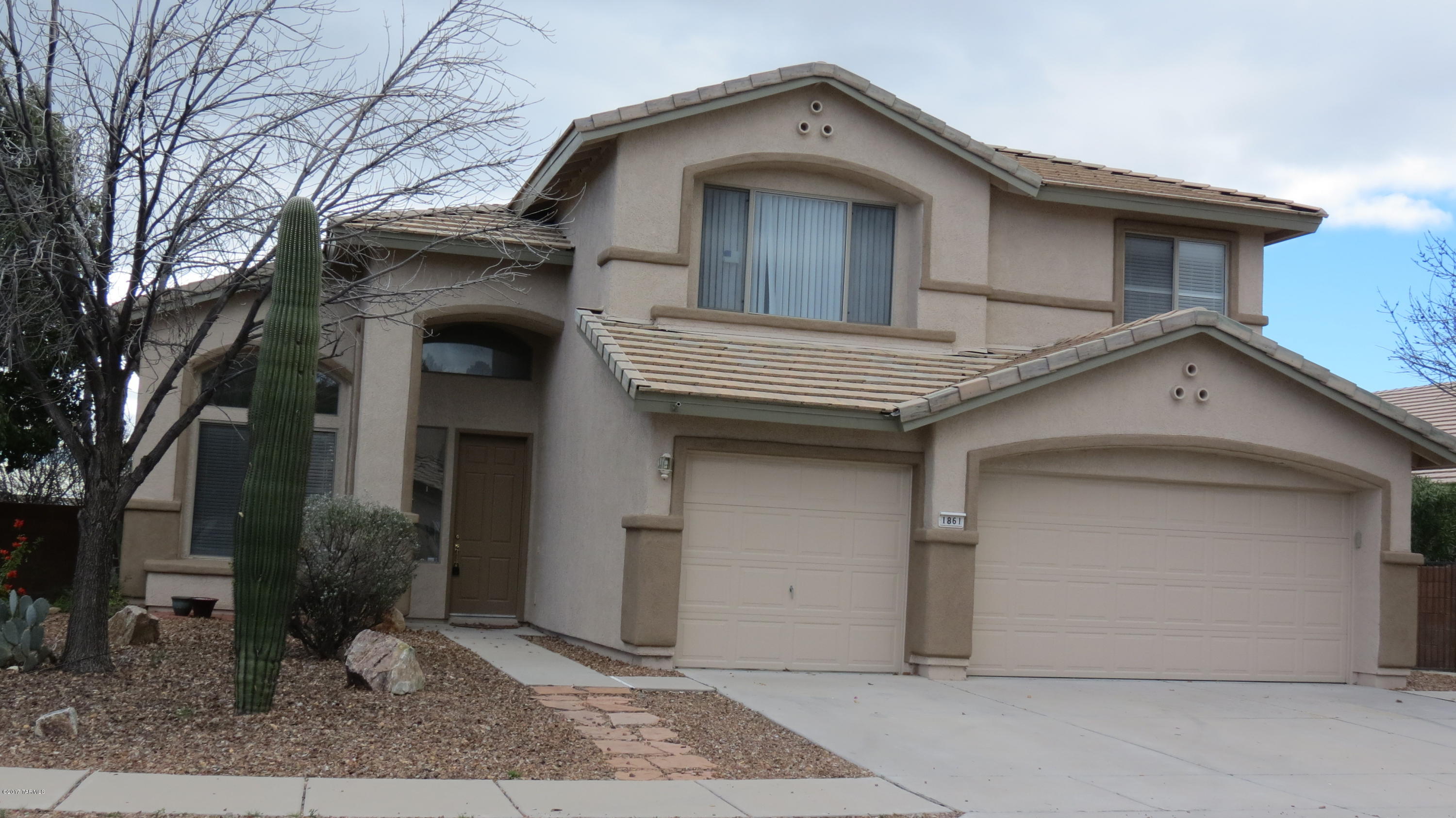 Awesome 5 bedroom 4 bathroom home, this home offers very spacious rooms throughout the home, formal living / dining rooms, large family room, very open spacious kitchen, 3 car garage, covered rear patio with mountain views, and sparkling pool, new tile floors and carpet and new paint. This home is  must see.