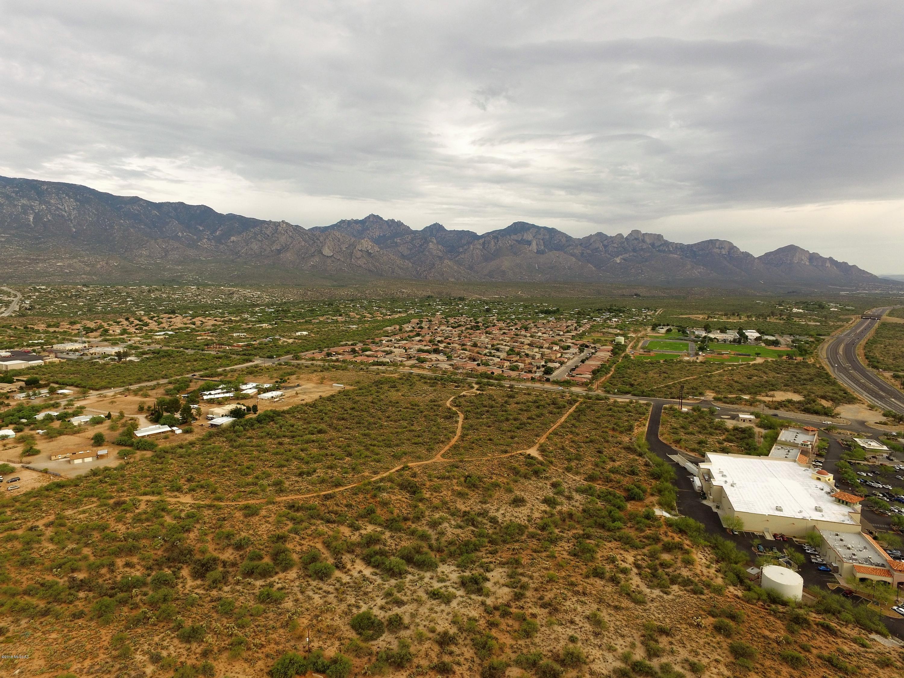 Beautiful property that offers lush vegetation and Stunning views of those majestic Catalina mountains, just waiting for the right future development.Just east of Bashas Shopping Center. Also available is  adjacent parcel -Seller also offers PN#222-22-015A 2.5 acres, PN#222-22-015B 2.5 acres, PN#222-22-0160 5 acres, 
PN#222-22-0170 8 acres
Owner will work with buyer to purchase all or separate parcels. Call for information.