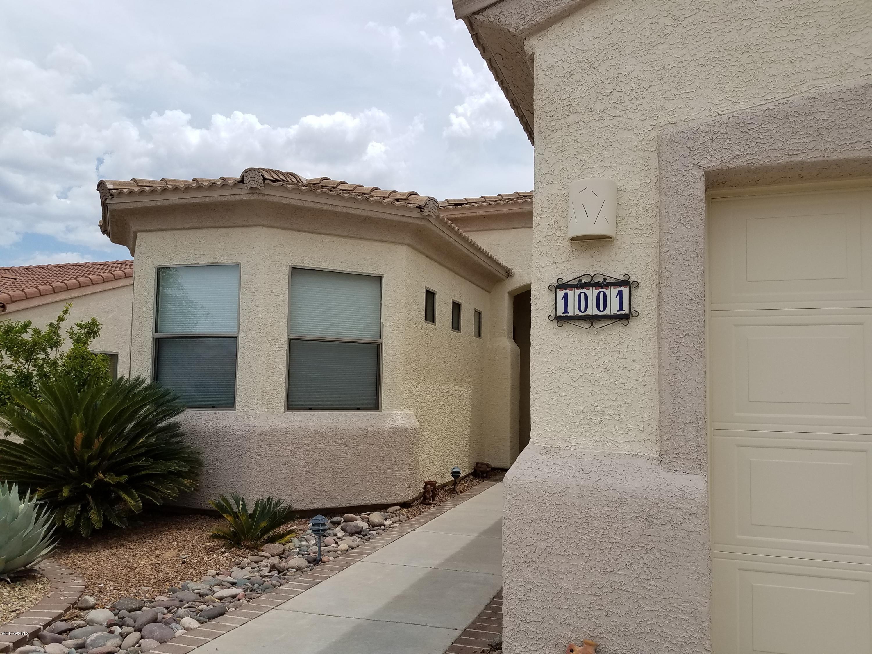 View and privacy! This home, with some TLC can be your forever home either part time or full time. New flooring, fresh paint is all you need. Corian kitchen counter tops, extended garage and great storage.