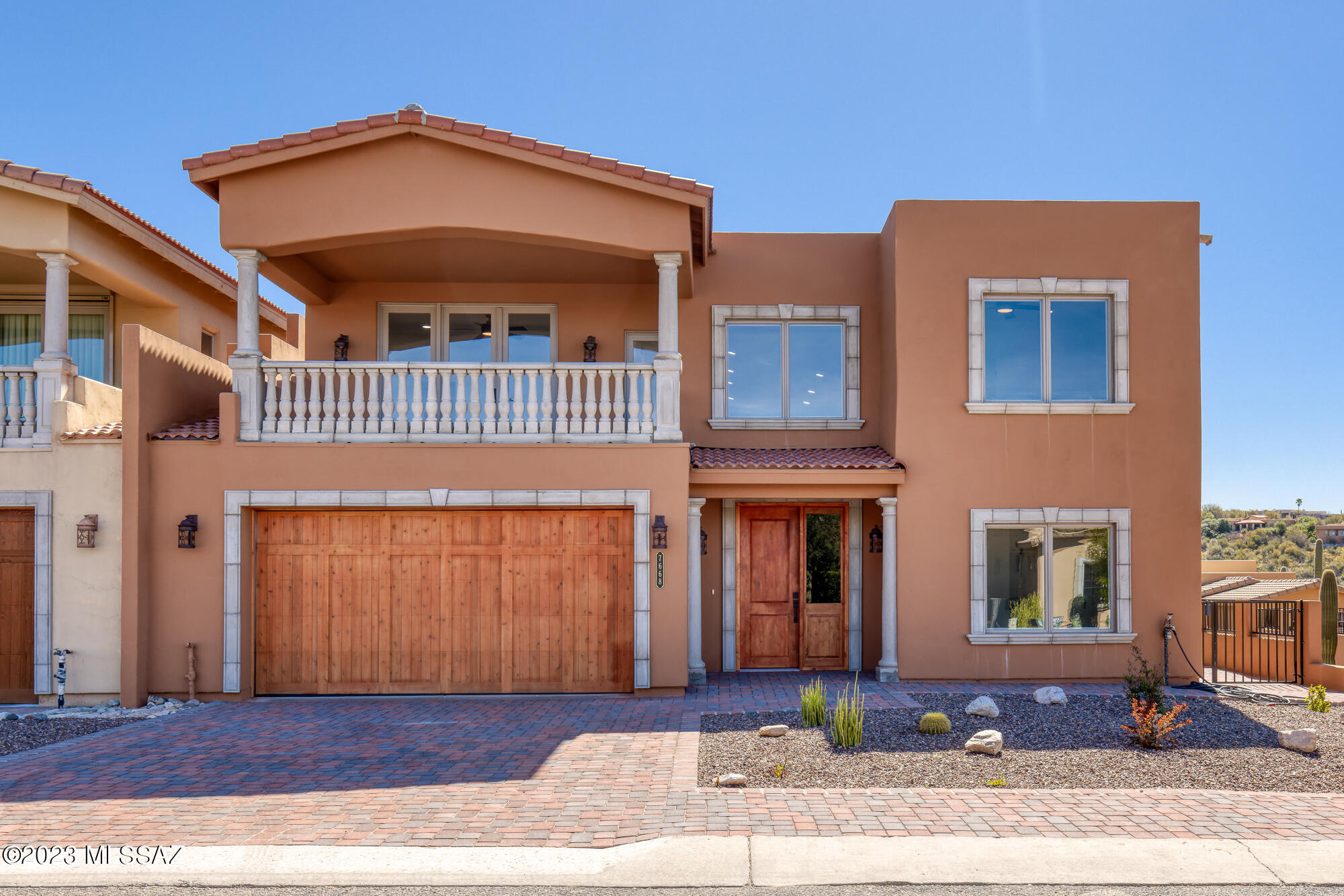 Newly constructed home in gated & desirable Sin Vacas community. This 4 BD/3 ½ BA/DEN/2,740 Sq.Ft home offers amazing Catalina Mountain & city views. Lower level features gourmet kitchen, dining area, family room, guest bedroom, laundry room & large master suite. Kitchen has white quartz counters, white cabinets w/black pulls, tile backsplash, walk-in panty, island w/breakfast bar & sink & stainless steel appliances. Master suite offers French doors to patio, dual vanities, tiled shower & large walk-in closet. Upper level has a loft, 2 guest bedrooms w/Jack & Jill bath, 2nd master suite w/it's own bathroom & access to 2 balconies w/stunning views. Backyard has a covered patio & pavers to enjoy the Mountain views. Community pool is within walking distance. Terrific location close to... ......La Encantada, restaurants, schools, shopping & more.