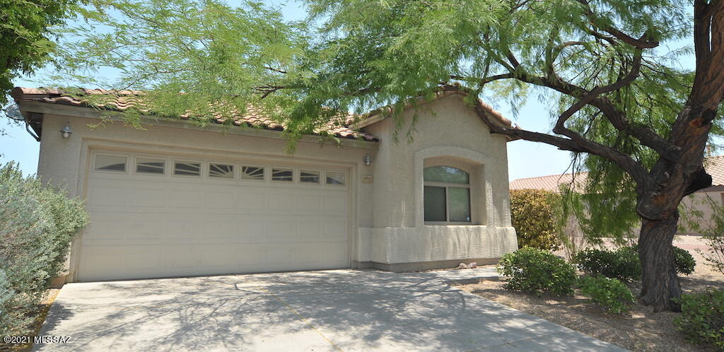Great Room Concept 3 bedroom 2 bath with open floor plan in Desert Willow Estates. Across the street from community park and kids play area. Recently updated wood look tile floors and fresh paint. No carpet. Open kitchen with big breakfast bar/island, gas stove, walk-in pantry, maple cabs & stainless appliances. Big vaulted ceiling great room with picture window that is also pre-wired for surround sound. Primary suite has dual closets, one of which is a walk-in, dual sink vanity and a garden tub. Beautifully landscaped yard is perfect for entertaining and relaxing with gas fire pit, covered patio and hot tub. Vail School District.