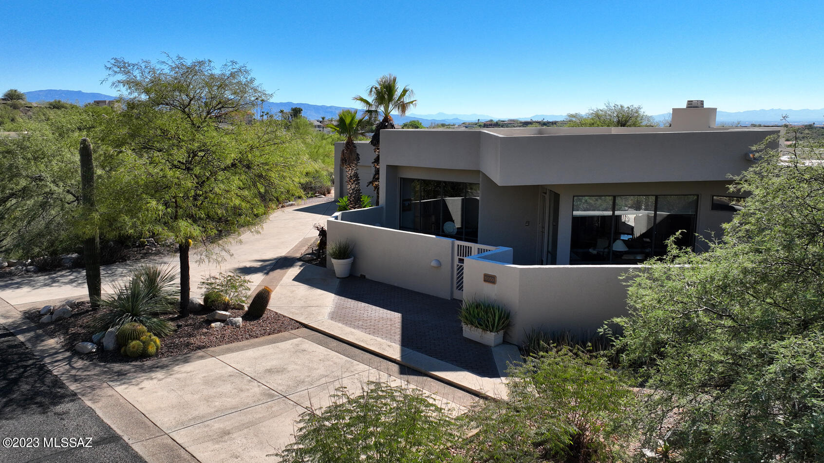 Located in the prestigious gated community of Finisterra.  This soft contemporary sits on a prime dead end lot.  Built by the current owners in 1993, this is the first time this house is for sale.  This home is 2,597 sq ft. , 3 bedrooms, 3 bathrooms, 3 car garage with office and bonus room.  Beautiful majestic mountain views, beautiful outdoor patio and a side patio off the primary bedroom.  This home is meticulously maintained. HORSES IN FRONT ARE PERSONAL PROPERTY AND DO NOT CONVEY..