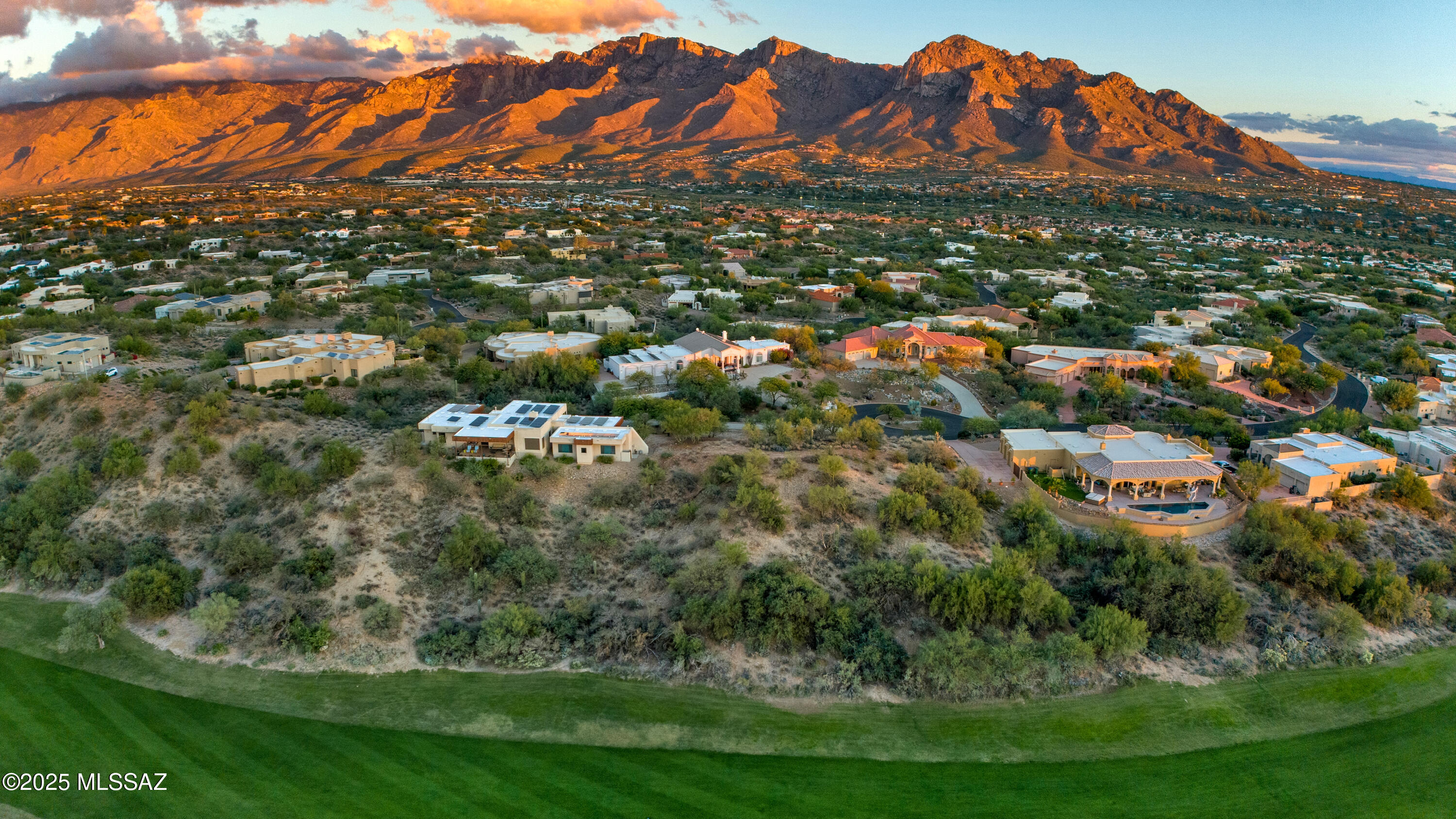 Seller will consider offers between 1.8-2.1m, depending upon finishes/upgrades. Construction has begun. Fabulous modern contemporary dream home on one of the best remaining lots in Oro Valley. Spectacular ridge line .89 acre lot in Canada Hills Estates. The lot boasts spectacular views of Pusch Ridge, full length Santa Catalina Mountain range, Tortolita Mountains, Tucson Mountain and El Conquistador Golf Course views. You can have it all. The amazing home will boast four bedrooms, three full bathrooms and a powder room. Open kitchen to a great room. Large separate family room. Over-sized windows and glass doors showcase the wonderful views from all angles. High ceilings, natural light, huge covered patio space all make for an extraordinary dream home. Three car garage. Some items may still be chosen by the buyer. Please reach out with any questions. Please reach out for a private tour with the builder.