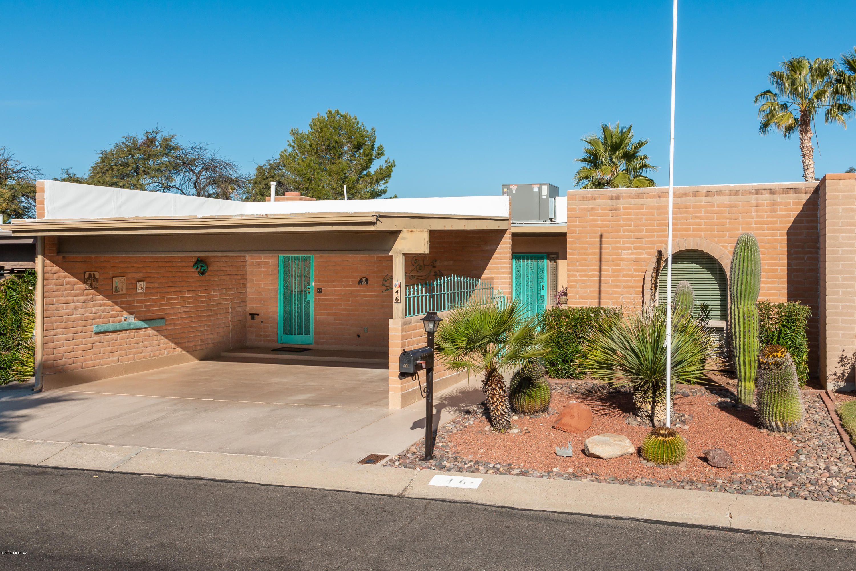 WONDERFULLY UPDATED, Fully furnished, move in ready Oro Valley Home!!! This 2 bedroom, 2 bath home has been thoughtfully updated to a bright and open floorplan. With tile and hardwood flooring throughout, the entry opens to a spacious living area & dining nook, just adjacent to the kitchen. Roof (new), AC, water heater and Low-E windows/doors all upgraded within the last 5 years along with remodeling of the kitchen and bath.  Lots of storage space throughout the home.   A large north-facing backyard, with views of the Tortolitas, has plenty of room for private rear seating. Or take in the stunning Pusch Ridge views from the front yard!!! Community includes use of 2 pools, spa, sauna & clubhouse.