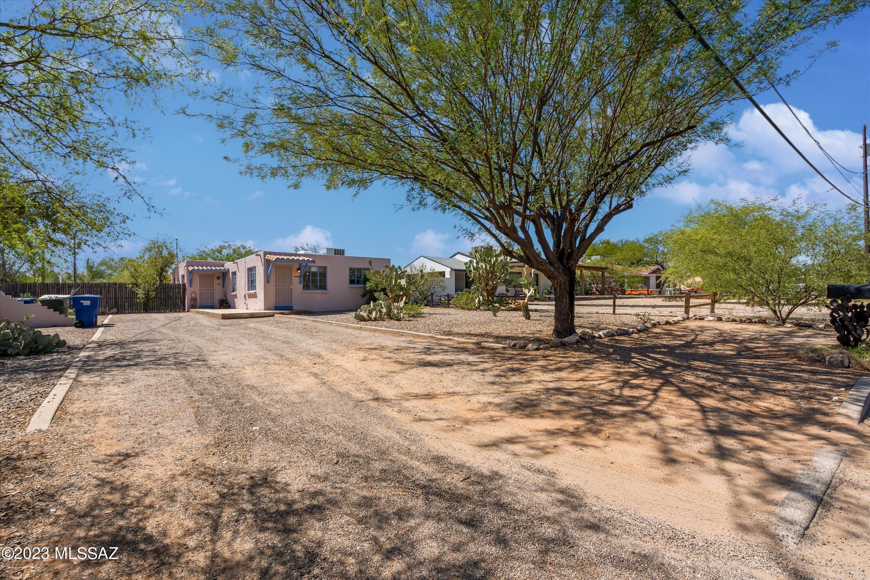 Located in the Historic Blenman Elm district, close to U of A, Banner Hospital, schools, restaurants, shopping.
Updated but still retains some mid-century charm. Large bedrooms, tile floors through-out, good storage space.  Large backyard fully fenced and separated for privacy between units.  Laundry is located in an enclosed room on back patio and shared by both units.  Gas lines replaced, upgraded electrical, roof recoated 2022.  Tenants currently on month-to-month, 2940 will be vacant end of October.  Seller has been a licensed real estate agent in Arizona, no longer active.