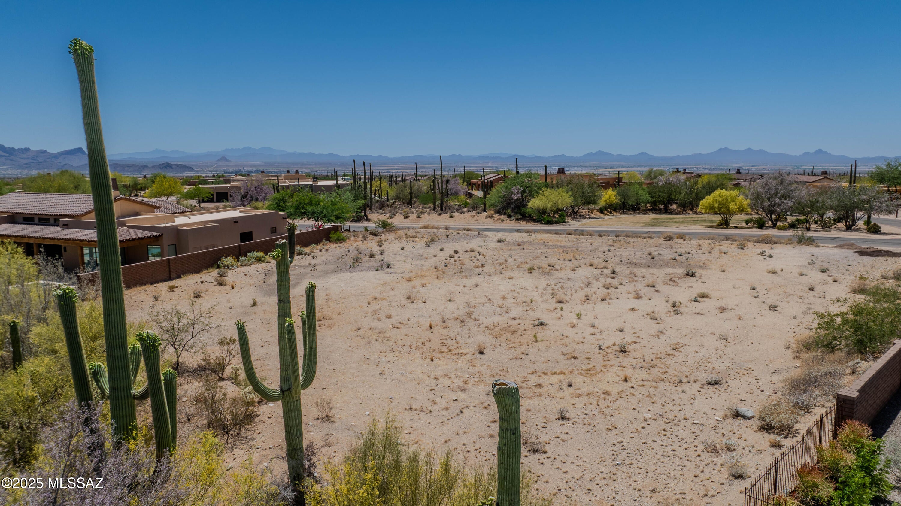 Build Your Dream Retreat at The Ritz-Carlton, Dove Mountain.

Perched within the exclusive gates of The Ritz-Carlton Residences at Dove Mountain, this 0.64-acre homesite offers the rare opportunity to craft a custom luxury estate surrounded by panoramic mountain and canyon views with direct golf course frontage. Set in a quiet, elevated position, the lot captures the serenity of the Sonoran Desert while placing you steps from world-class resort amenities.

Ownership includes access to legendary Ritz-Carlton services- from concierge and home management to curated social events, spa indulgences, golf, fitness classes, and more. Whether you're building a winter escape, a future retirement home, or a lock-and-leave desert sanctuary, this property delivers on both lifestyle and legacy. Design the home you've always imagined where resort-style living meets refined privacy all in one of Arizona's most prestigious communities.