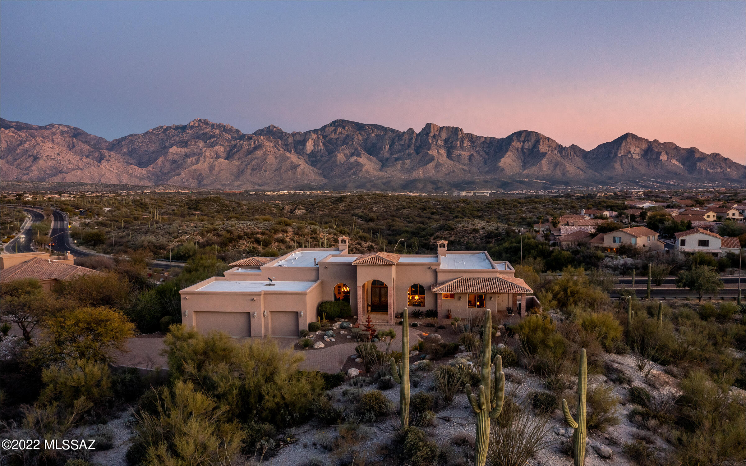 Majestically perched in Honey Bee Canyon Estates w/spectacular mtn, city, sunrise & sunset views from this elegant Hacienda style home. Featuring luxurious living w/modern & timeless designer elements. Private paver driveway leads you to a charming courtyard w/a flowing fountain. Upon entering one is immediately transported to a vast foyer filled w/natural light & endless views, it will take your breath away! Split floorplan flows seamlessly w/polished travertine & new ceramic wood-like tile. Gourmet modern kitchen offers the highest quality appl, large center island & breakfast area. Family rm features a stone fp w/raised hearth & more views! Beautiful master suite has secluded access to yard. Roomy 3 car garage has new Calif. Closet cabinets. Refreshing pool/spa & lush desert landscape.