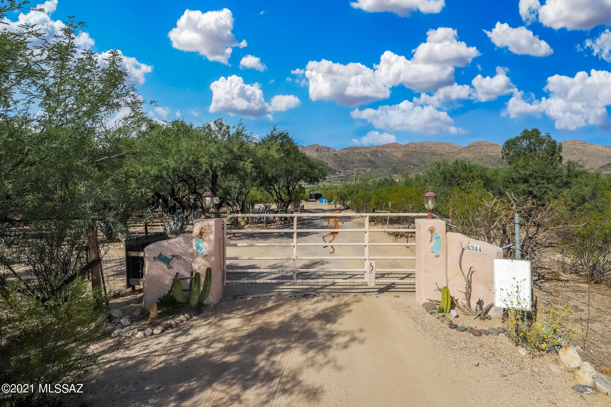 Caliente Creek Ranch is a special place for  guests and owners. It is an owner-run vacation rental property nestled on beautiful 5.6 acres of mesquites and desert tranquility.  Three vacation rental units (one is owner occupied) and a RV spot. Completely turnkey ready to go and operating. Dorothy's Cottage is already booked into next May and The Breeze is now close to the same. These homes are completely furnished, everything you need is here. Most furnishings will remain. The RV space has stayed rented for the past 3 years with full hook ups and satellite TV from the main house. Dorothy's cottage is a beautiful large 2 bedroom 2 bath house alongside the main house, the winter season has been booking out a year in advance for the past 5 years with many returning guests. The Breeze is a 2 bed one huge bath unit above the main house with a private spiral staircase entry. It has awesome views of the mountains and the Agua Caliente Wash that crosses through the property. It actually runs about a quarter of the year. The main house is a large home with 1 bedroom one bath and a loft. The owners occupy this unit. it could also be used as another vacation rental unit. Wildlife that visit the property include javelina, quail, bobcats, deer, coyotes, racoons, ground squirrels, and many types of birds. Enjoy the beautiful pool or sit outside and have a fire at the outdoor fireplace. It could be a home for horses also. Too much to mention it all. Since all the rental units are occupied special arrangements will need to be made to see the insides Please very seriously interested parties only. The owners would be willing to share any business and property knowledge necessary to continue this wonderful profitable business/residential opportunity.