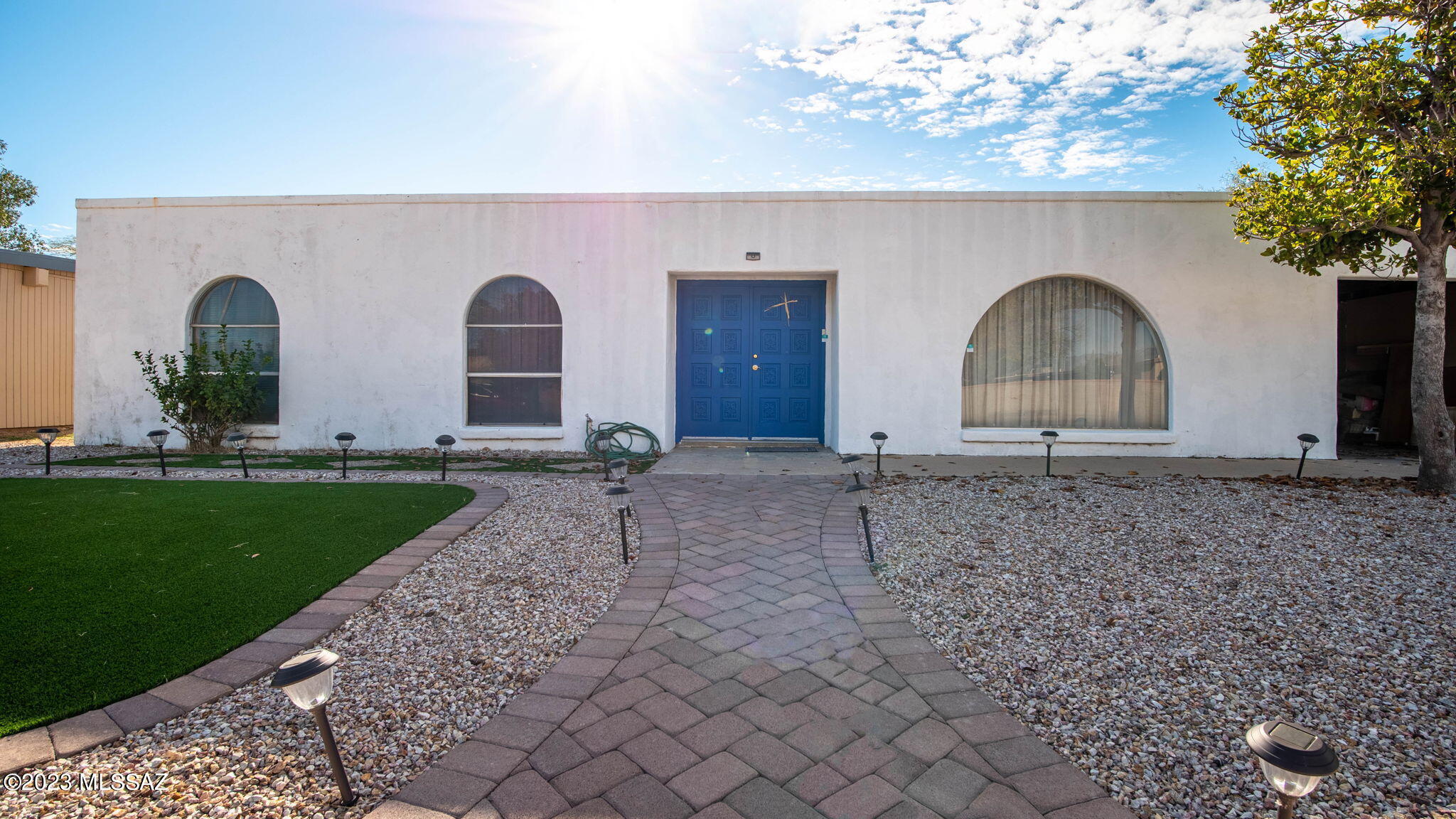 Located in the heart of the east side is a solid brick home with stucco finish. four bedroom, three bathroom home with plenty of square footage.  This home offers an open kitchen with dining area, a spacious living room and a formal dining room. Down the hall you will find three generously sized guest bedrooms and a master bedroom with large en-suite and walk in closet! In addition to separate living room, there is an oversized family room and separate laundry room. Throughout the home, you will find canned lighting, high windows to bring in the natural light and pre-wired surround sound. The backyard is your blank slate with a large lot and privacy!