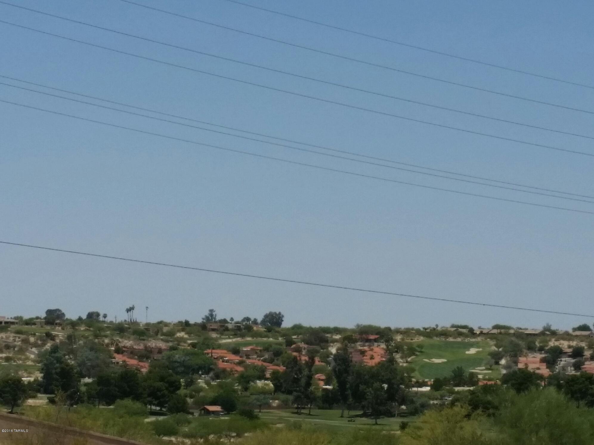 Great residential development opportunity (6.5 acre total). Central northwest area with great views. Adjacent to Tucson National Golf course and north of the Foothills Mall. Seller will sell subject to rezoning. The parcel is being sold in conjunction with contiguous tax codes: 225-21-0090 & 225-21-0100(2.92 Acres) which is a separate owner. Total acreage is 6.5 acres