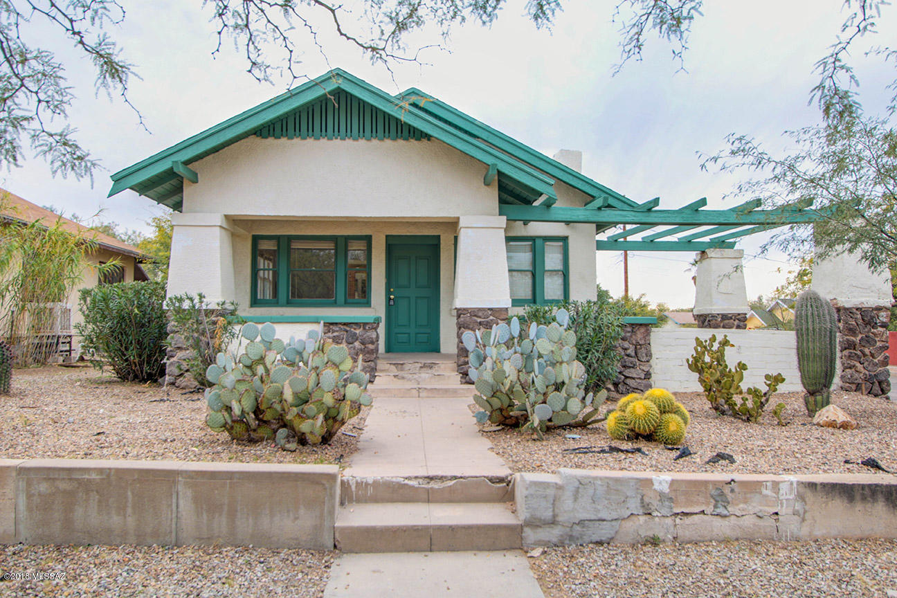 1921 Tucson gem in historic Feldman neighborhood with a 3BD, 2BA main house, plus a studio guest house with full bath and full kitchen! Guest house is rent-able for around $500-$600/month. You can literally walk to the University of Arizona campus in about 5 minutes; only 2 blocks from West University. This home is beautifully renovated with white oak floors throughout, brand-new central A/C (10-year warranty), high ceilings, stainless steel appliances, a separate office, and a separate dining room. Most of all, your family will love the historic charm that this home has to offer & the great location! Literally walk to University Blvd, historic 4th ave, & all the wonderful downtown Tucson treasures. Owner/Agent.