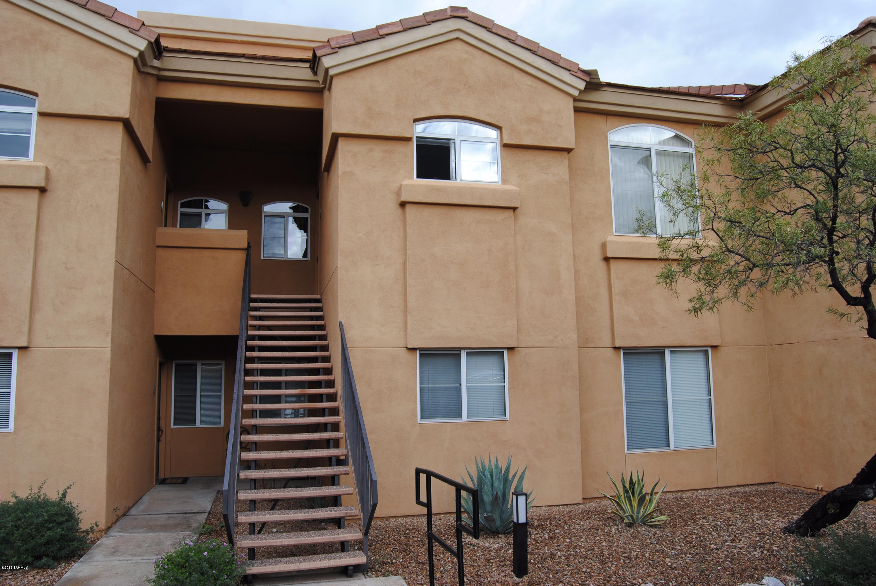 Super cute second story condo located in the coveted Catalina Foothills School District! This condo features a nice gated community with a rec center, pool, exercise facilities, & much more! There are 2 bedrooms, 2 bathrooms, a soothing fireplace, cute kitchen, wonderful living area, and AMAZING mountain views! Come see your new home!