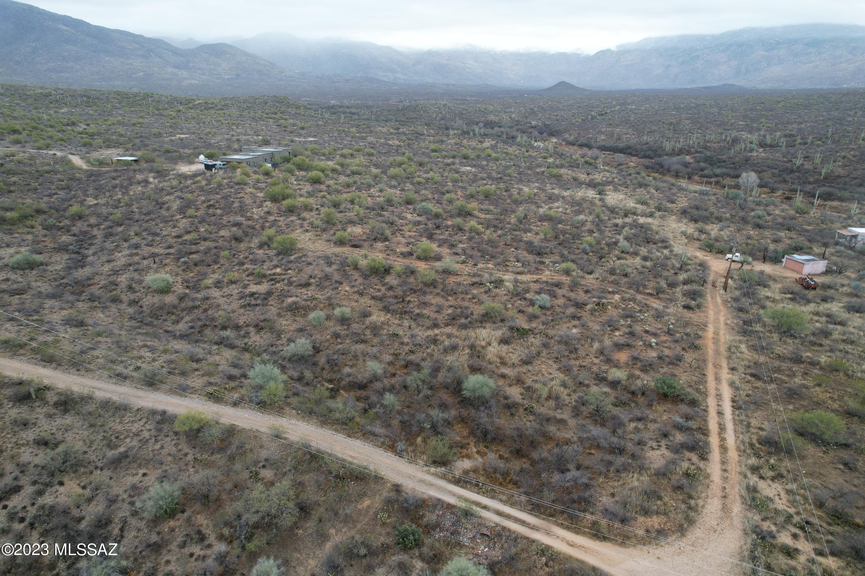 If you are looking for panoramic views of the Rincon Mountains and Catalina Mountains, you have to see this property in the Vail School District. Beautiful desert landscaping with rolling hills and amazing views. Access road & electric poles are along the property's west boundary. And there's a driveway along the south boundary. This lot is very easy to visualize when you visit. The lot rises from the road to the build site with panoramic views into Saguaro Ntl Park East. Park boundary is about 400ft east of the property! Gorgeous custom homes in the area. Property was surveyed in 2019. Nearby water wells indicate reasonable depths of 275-300ft. Info and maps attached in MLS documents.