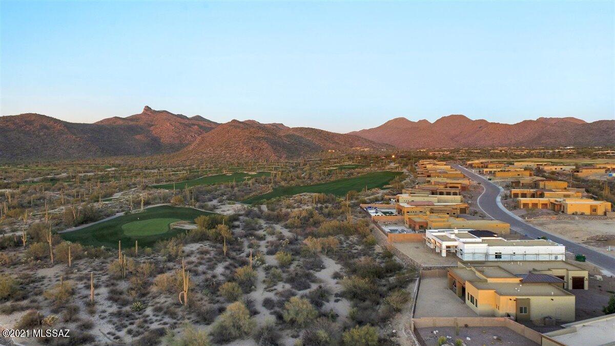 WHY WAIT 10-12 MONTHS FOR A NEW BUILD - when you can move into this four month new Miramonte Brady Ranch Plan with all the upgrades you ever wanted.  Premium lot that has a view of the #1 green (Saguaro) of The Golf Club at Dove Mountain.  

Miramonte home warranty is fully transferrable to the new owner.
All new (2 months old) see below:
Sub Zero Fridge
Wolf Range & Oven
Bosch Dishwasher
Water Softner
Hot Water Recirculating Loop
Reverse Osmosis

Over $20,000 of fully remote controlled  blinds/window coverings installed on February 05, 2021 - with full warranty.

Universal TV mounts will stay, but the actual TV's do not convey. 

Back yard is a blank canvas so you can create your own oasis! Don't miss out on this brand new build on a premium lot surrounded with gorgeous mou