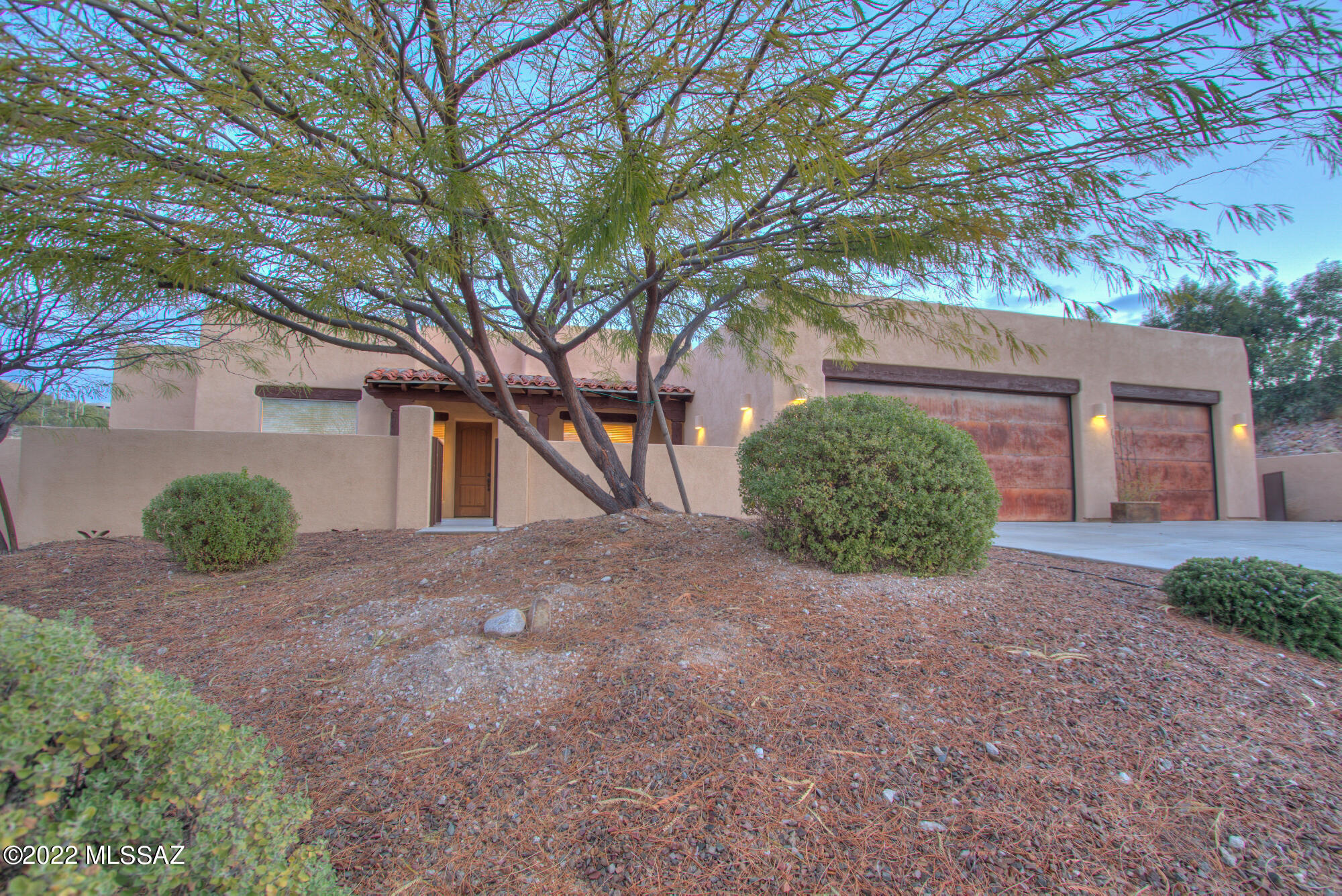 Seller will accept or counter offers between $1,000,000-$1,100,000. Territorial Custom home in the heart of the foothills is located on a corner lot in the highly sought after gated subdivision of Rio Verde Vista. Step in through the courtyard into this breathtaking estate, features 4 bedrooms, 4 baths, with 3 car garage, a den, great room with gas fireplace, formal dining room, luxury gourmet kitchen, gas cooktop, kitchen island with granite countertops, 18inch tile and plush carpet throughout. The oasis-like yard offers a  perfectly sized pebble tec pool and spa for relaxing, North facing backyard to enjoy the mountain views.