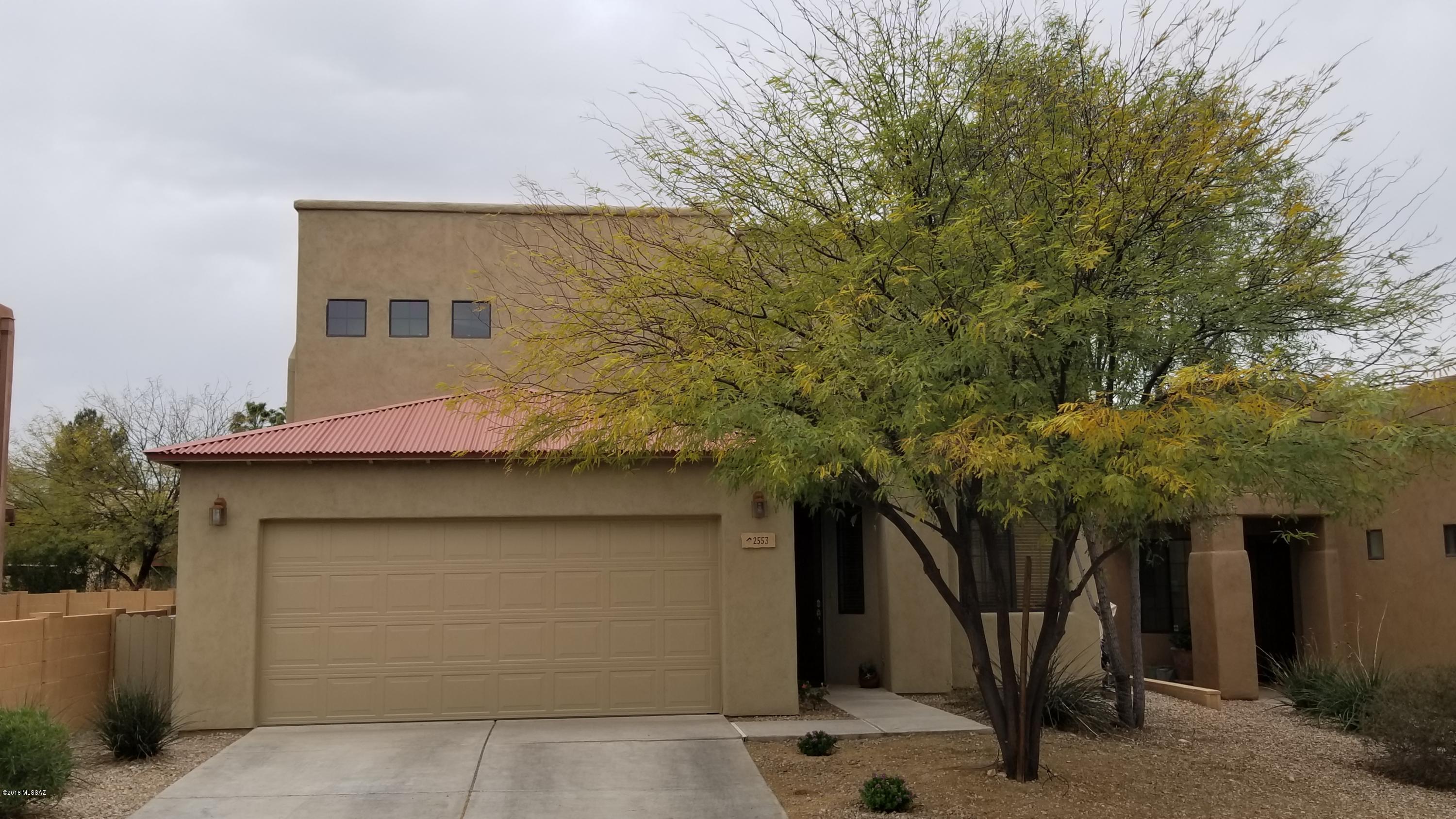 Brand-new updates in this sprawling 2500sf 4br/3 full bath home in the exclusive Red Adobe Pass gated community. Located in the highly-desirable Tanque Verde/Pantano area, this stunning home features a gourmet kitchen with granite countertops, 42'' upper cabinets, new SS appliances & island, 4 spacious rooms, large covered patio, backyard with multiple sitting areas, 2-car oversized garage (4ft extension) w/ durable epoxy flooring & bonus loft! Enjoy mountain views from the loft & upstairs bedrooms. Master bath features dual sinks, vanity area, & a 6'x6' glass block window for plenty of natural light. Only 10min from Sabino Canyon. Right across the street from Udall Park with community pool, exercise facilities & outdoor activities. Close to nature yet easy access to shopping & restaurants