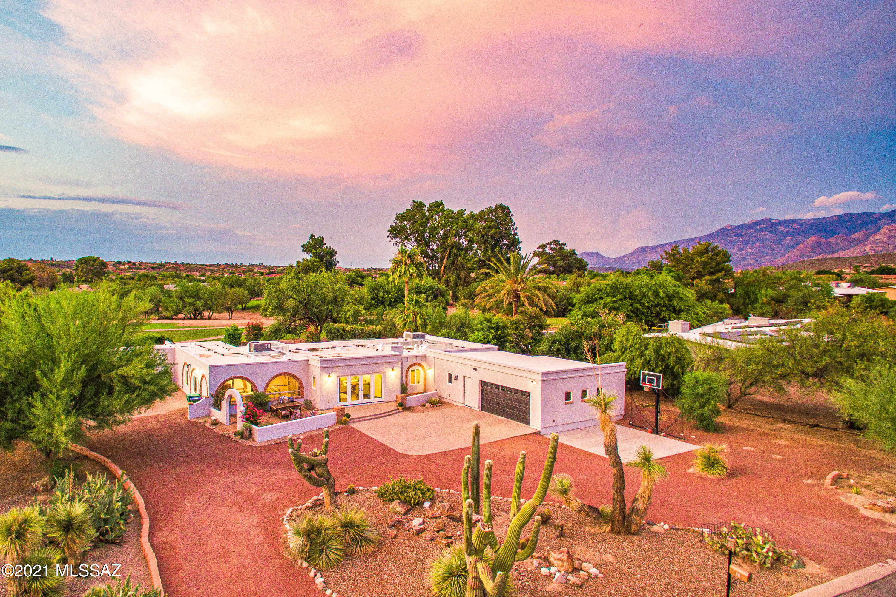 This 4 bed + casita is one of the original designs in the Oro Valley Country Club. This home features that 70's contemporary feel with today's modern touches. While keeping some of the original Tucson flair this home was remodeled to feature the open floor plan we all love with a lots of updates. The beautiful brand new kitchen features 3 ovens, marble counter tops with a large oversized island for all your entertaining needs, beautifully designed new slate cabinets, and a large farm-house sink. The beautiful master bedroom is perfectly separated from the other 3 bedrooms located on the opposite side of the house. Don't miss the separate casita located on the outside of the house to give a sense of privacy for all your guests which includes a sitting area plus full bath. Price has been....