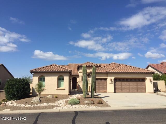 This beautiful Covina floor plan at 2093 sq ft is enhanced by a 275 sq ft Casita w/ Full Bath and a view of the Golf Course and Tortolita Mountains that is amazing.  This 2 Bdrm/2.5 Bath home has a Den with built-ins, and can be an optional 3rd bdrm.  The Great Room has a gas fireplace and lots of room.  The Large Swimming Pool/Spa w/ Paver Patio will make you popular with the family. Bdrms have upgraded carpet.  Windows have Plantation Shutters and Bay Windows.  Whole House Water Filtration makes living easy.  The Courtyard (258 sq ft) between Casita and Main House makes for a cozy place to sit in the winter sipping those hot toddies w/ friends.  Garage has storage cabinets that provide room for all your needs.  You've never experienced an Arizona Sunset until you've seen one from here.