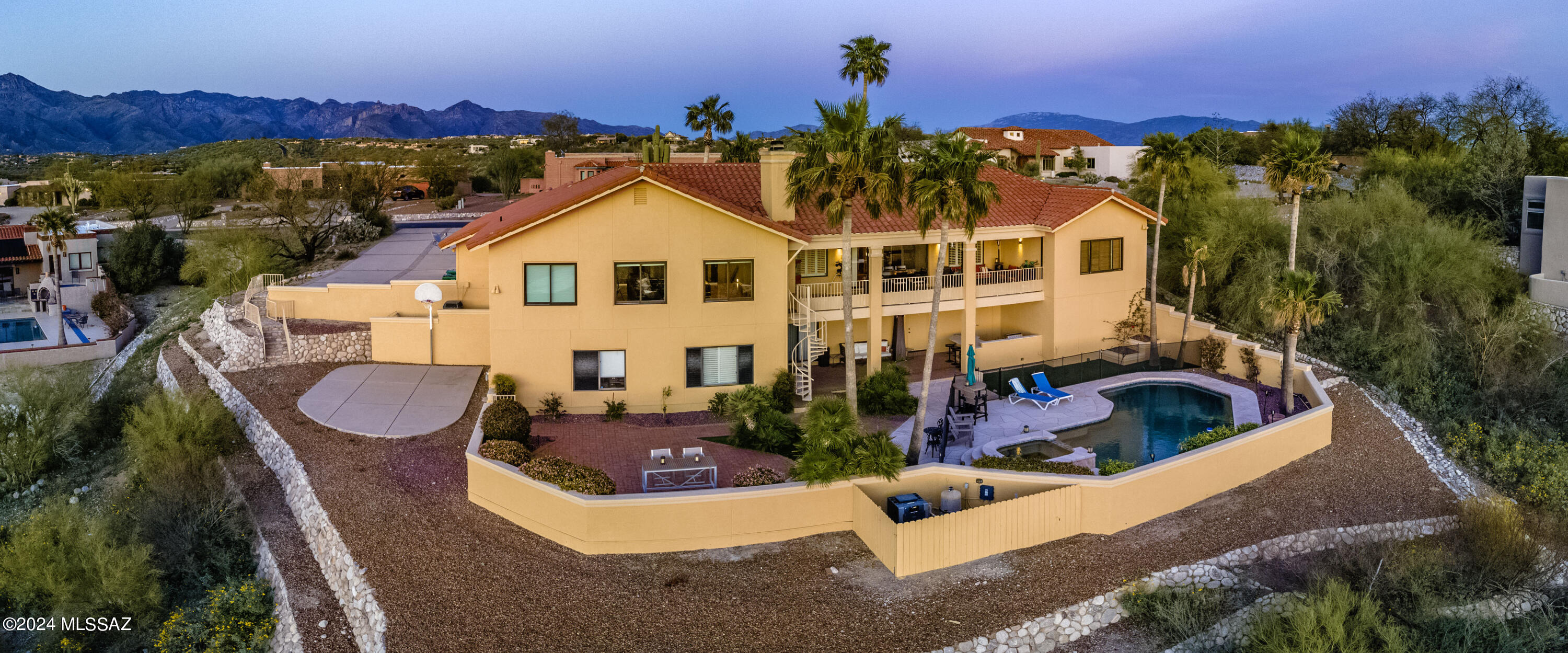 This luxurious Foothills gem has it all. With exquisite modern finishes, spectacular city and mountain views, vaulted ceilings, a spacious 4BR/4BA floor plan, 3-car garage, sparkling pool & spa. Beautiful landscaping, freshly painted inside and out, this residence leaves nothing to be desired. Hardwood & Travertine flooring. Fabulous kitchen with stone counters, 6 burner Wolf Range, water softener, GE Monogram appliances & wine cooler, Samsung smart fridge, full extension soft close cabinets, a large island, breakfast counter. Formal dining room. Take in the sunsets by the outdoor BBQ, or enjoy the wonderful views from inside Primary features fireplace dual sinks and walk in closets. This immaculately cared for home will surely satisfy even the most discriminating tastes.