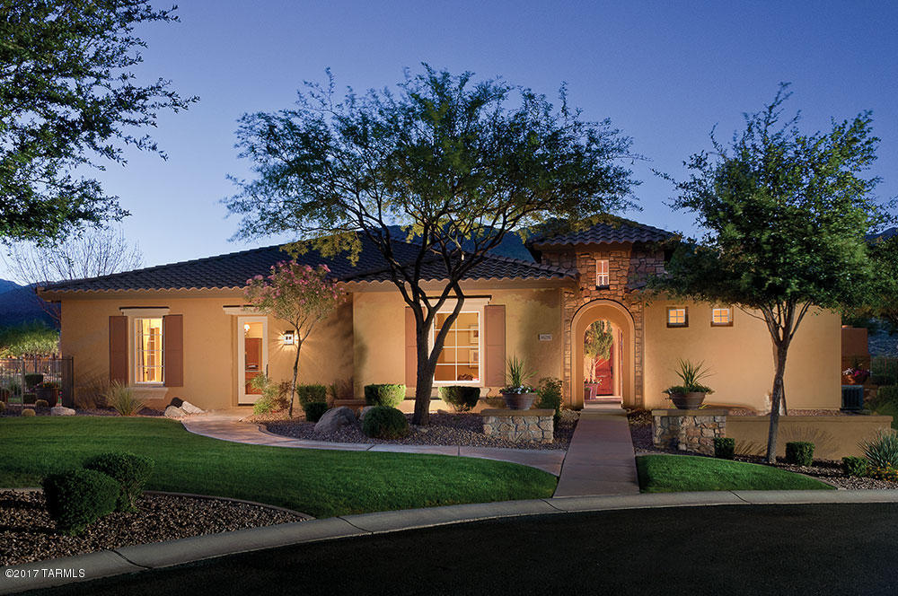 Highly upgraded Sonoran model on a LARGE premium golf course home site w/GORGEOUS VIEWS! Upgrd Knotty Alder Cabinets, Granite countertops & full height tile backsplash, Kohler unique undermount sink w/sliding cutting board, GE Monogram SS appliances w/slide in upgd oven and built-in wall oven/warming drawer & microwave, built-in Monogram Refrigerator, Bronze Bath faucets, Tile vanities at master bath, upgraded lighting fixtures, custom tile surrounds & glass block in dual entry & shower heads at master shower,  Pool & expanded patio & BBQ area. Mature professional landscape. Full laundry cabinets, Casita, FP, Travertine stone floors, Built-ins & wood wainscoating in Den. Lg covered patio. Upgraded lighting &  professionally decorated Furnishings all included! Call for more details.