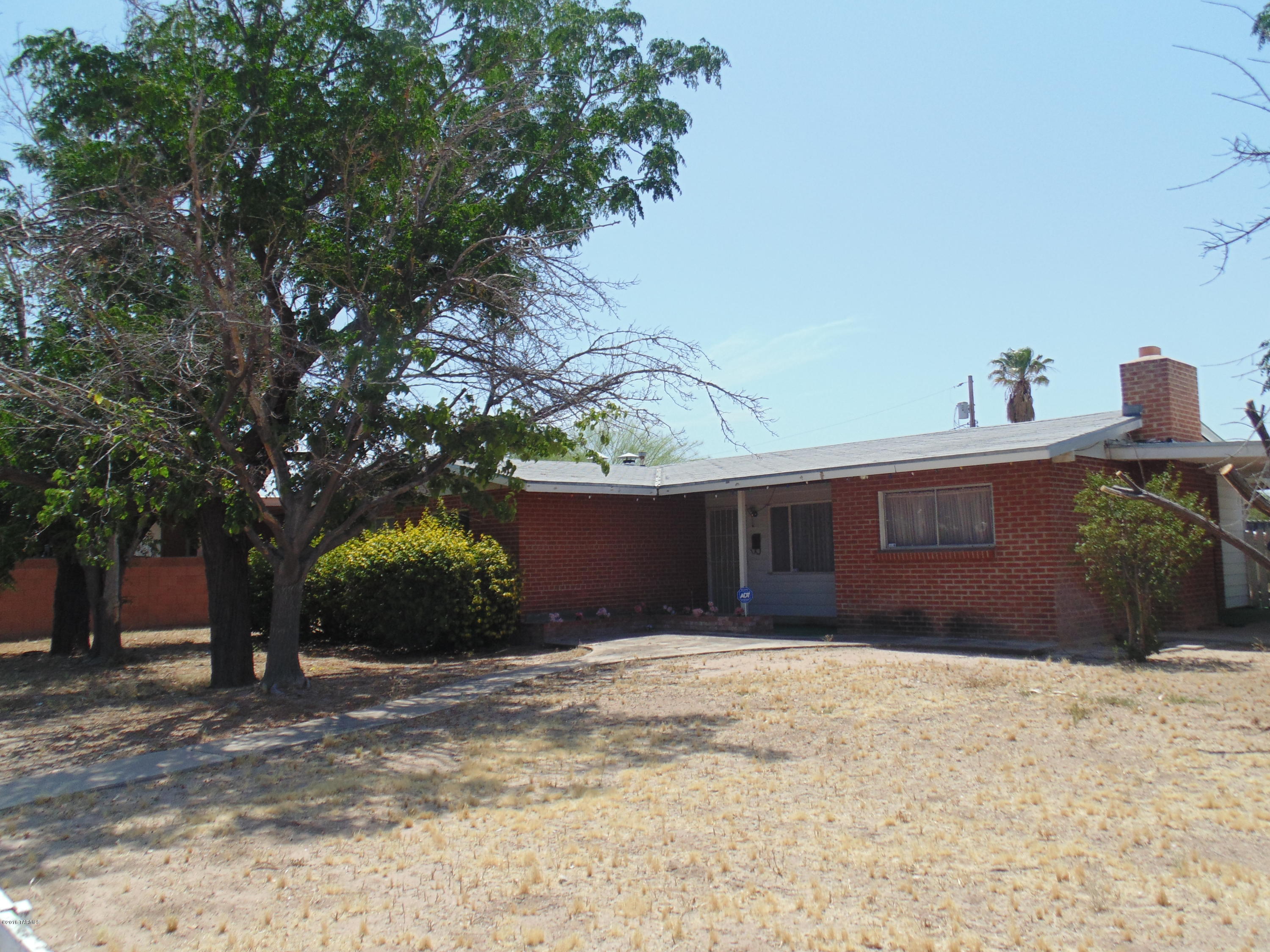 Great price for a large 3+ bedroom red brick home on the East side.  Home perfect for investor, first time home owners or anyone looking for a large home at a good price with a little TLC and some upgrading.  Home features large living room and family, work shop, den, tons of storage and more locate with quick access to shopping, bus line, DM Air Force Base and more.