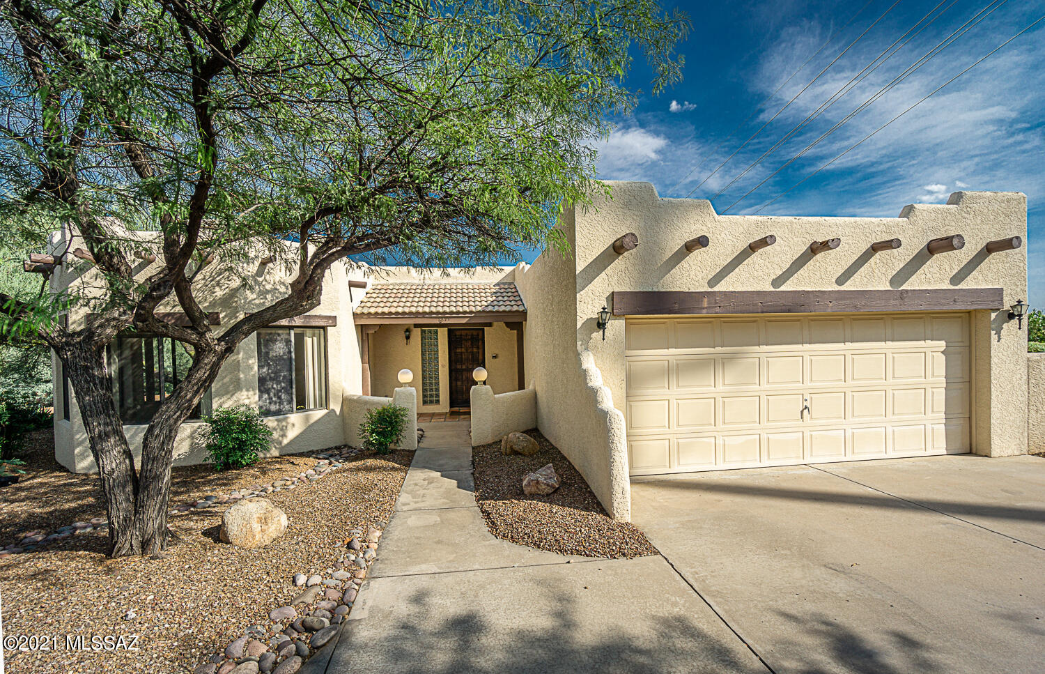 A magnificent Green Valley setting with panoramic mountain views, on a large private lot that's over 1/2 acre!  This spacious home has 3-BR and 2.5 baths,
 2464 square feet.  Inviting and dramatic great room has high ceilings,  transom windows filling the room with natural light, gas fireplace, and a focal point of spectacular mountain views. Large dining area in great room. The large eat-in kitchen has many windows to provide brightness and capture the outdoor beauty too.  Skylights add more natural illumination to this special home Master BR features a large patio door to view the mountain scene, and opens to the covered patio.  Patio doors include retractable rolling shutters. Wrap around covered patio overlooks beautifully landscaped yard with VIEWS, VIEWS, VIEWS !