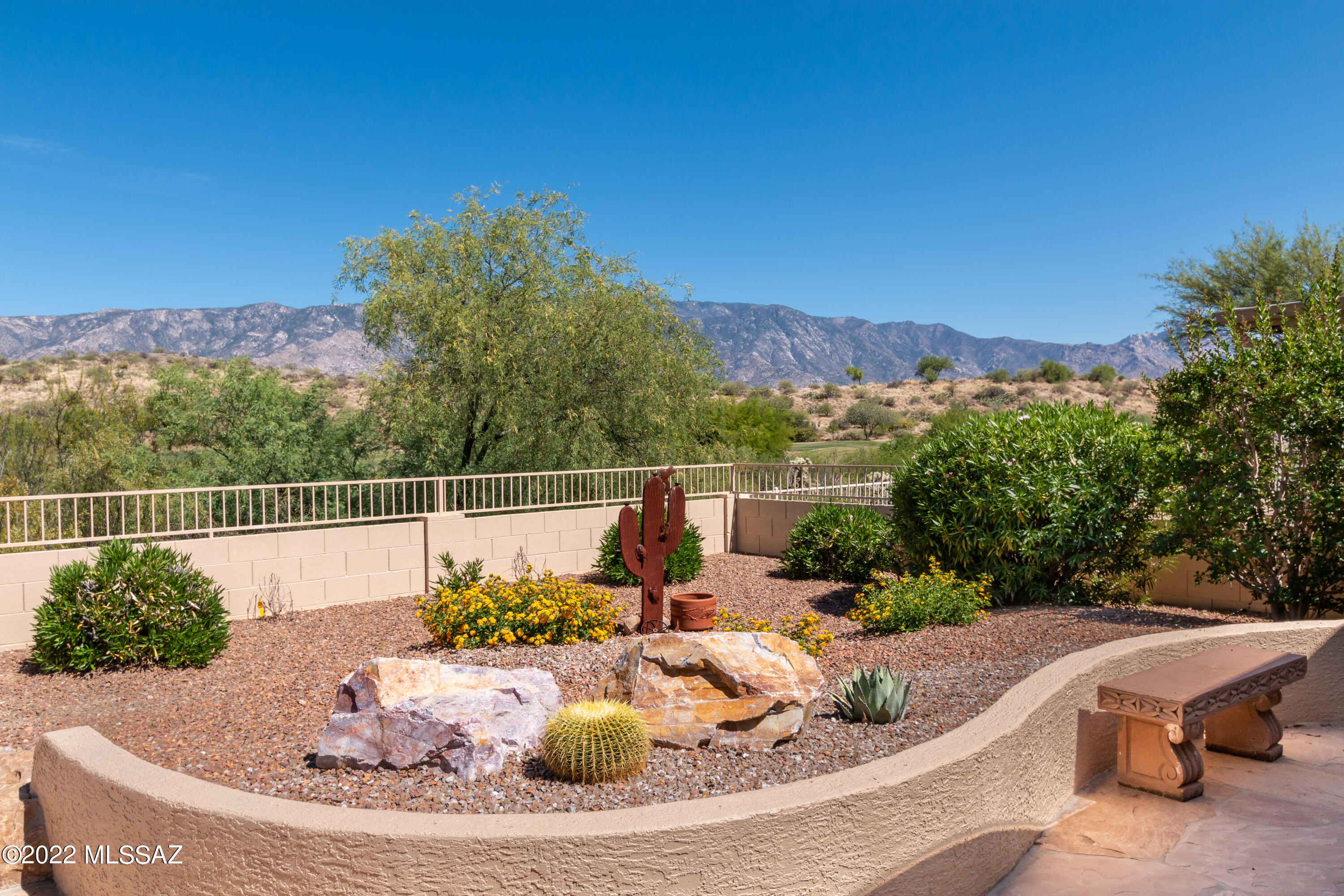 Magnificent Unobstructed Catalina Mountain Views and Distant Golf Course Views of the 3rd Green of
the Mountain View Golf Course! This Expanded Sedona Floor Plan has 2 bed + den/3rd bedroom with a 
2 Foot Extension on the Bedroom Side. Garage is Extended 8 ft Giving Lots of Room for Storage. Kitchen is Updated with Hickory Cabinets, Granite Counters, Stainless Steel Appliances, Gas Range,
and Island. Updated Landscaping and New Irrigation System. Enjoy the Tranquil Patio Setting With Gas Firepit, Waterfall and Built-In Gas Grill/BBQ Outdoor Kitchen. Furniture Available on Separate Bill of Sale. Welcome to Saddlebrooke Lifestyle Living with 63 Holes of Golf, Tennis, Pools, Fitness, Restaurants and More!