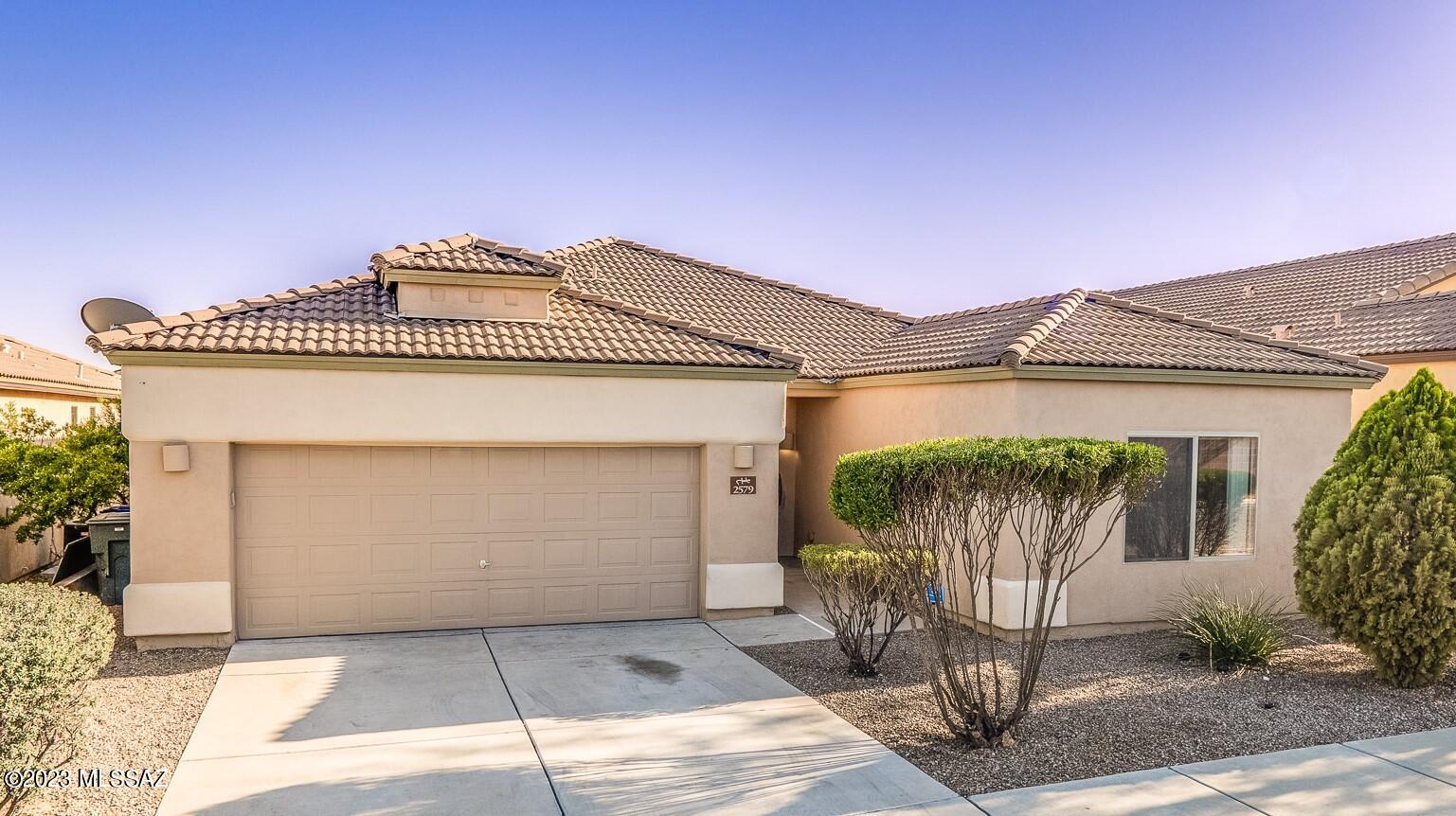 This beautifully maintained home is move-in ready with a neutral interior palette, split floorplan, and open living spaces. Easy care front landscaping with a blank canvas back yard space where you will find a desert and mountain view. Located in a quiet neighborhood, close to hiking trails, schools, parks, and minutes from all your shopping needs.

Minutes away from Pima Community College, St. Mary's Hospital, Starr Pass, Gates Pass; and easy access to I-10 and I-19, Downtown, University of Arizona and Banner Hospital.