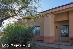 1514 N Paseo La Tinaja Townhome. 2 bedrooms, 1.75 baths, one car garage at Valle Verde complex non age restricted.
 This townhome is very nice with tile in living room and kitchen, baths, laminate flooring in bedrooms. Kitchen is nice size with eat in area, lots of cabinets for storage and nice size panty. Kitchen is equipped with electric stove, fridge with ice maker, counter microwave, dishwasher and desposal. Slider off of kitchen going to screened in patio facing south. All rooms have ceiling fans with lights and verticals at windows. Both bedrooms have walk in closets and master has on suite. Guess bath is large with washer and dryer behind louver doors and large linen closet for storage. Mountain top view from living room window and back yard. Pool and hot tub in Complex.