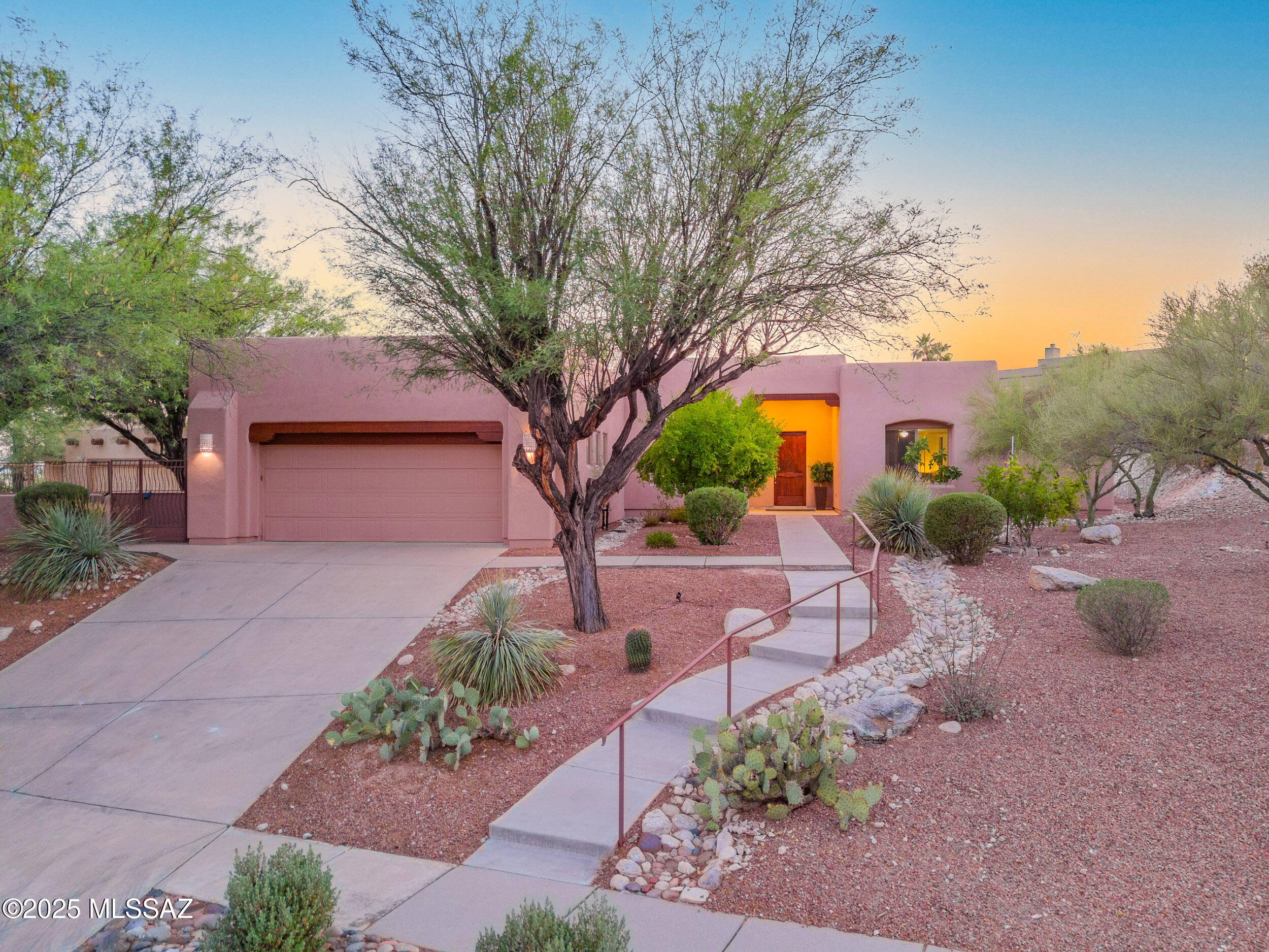 Welcome to the coveted Ventana Ridge gated community! This elevated lot has no neighbors behind it, giving you the peace and privacy you've been searching for. Immediately upon entering, you are greeted with soaring ceilings and large windows overlooking the heated pool and spa. The neutral color palette allows buyers the flexibility to truly make it their own. The sprawling space is over 3,000 sq ft on 1 story. Not only are there 2 large living spaces, but there is also a covered patio with gorgeous views of the sunsets, perfect for entertaining. The primary bedroom is spacious, while the bathroom features a walk-in shower and relaxing soaking tub. This home also features a FULLY OWNED solar panel system, an RO system, and all of the appliances, making this home completely move-in ready! This prime location not only offers close proximity to Sabino Canyon, but is also just 15 minutes to luxury shopping at La Encantada Mall, and is located within the highly rated Catalina Foothills School District. This property truly has it all. Schedule your showing today!