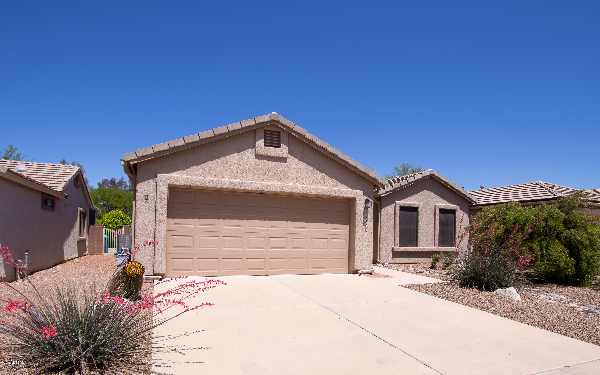 Are you looking for peace of mind??  We have you covered!!  This two bedroom two bathroom home has been LOVED on by its owners.  Since their ownership in 2013 they have put on a NEW roof; replaced the polybutylene plumbing with all NEW aquapex plumbing; added a stunning and spacious BONUS ROOM; replaced ALL the kitchen appliances(fridge, range, microwave, dishwasher, garbage disposal, and the sink w/faucet);  replaced the carpeting; installed a NEW water softener, put in a NEW air conditioner and furnace; installed a NEW garage door and opener; and two matching chandeliers!!!  Home has hot H2O re-circulator; front security door, garage cabinetry; fully landscaped backyard with mature citrus trees, pavers, and a firepit/planter.  See attached documents for more home & community information!
