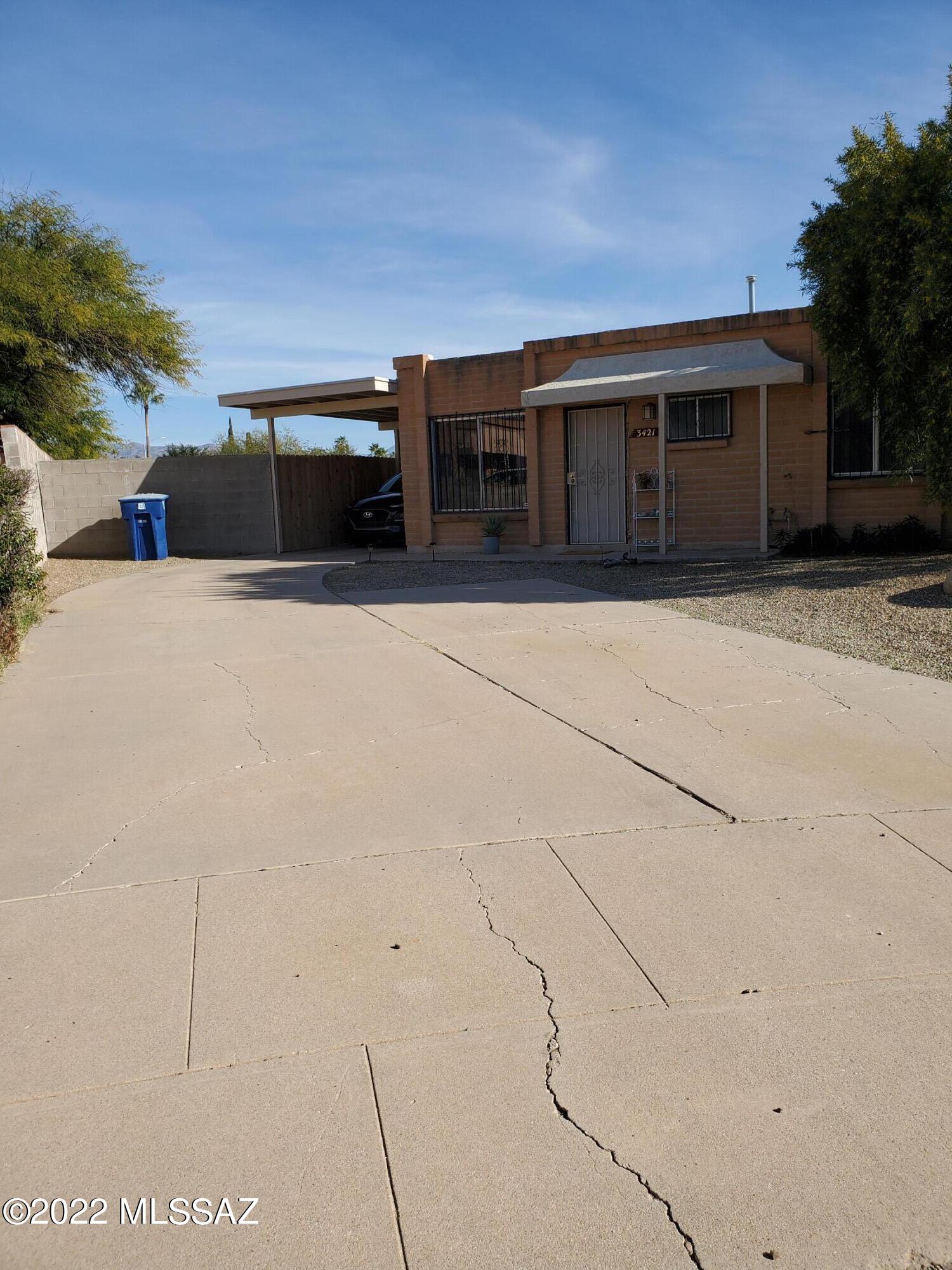 This lovely 2 bedroom 1 bath townhome sits on a very large cul-de-sac lot which will accomodate all your toys. The home features tile throughout great room, dining area and spacious kitchen. Lots of storage. Very convenient to shops, Davis-Monthan, minutes from I10 and Tucson Airport. NO HOA - all appliances convey ''as is''.