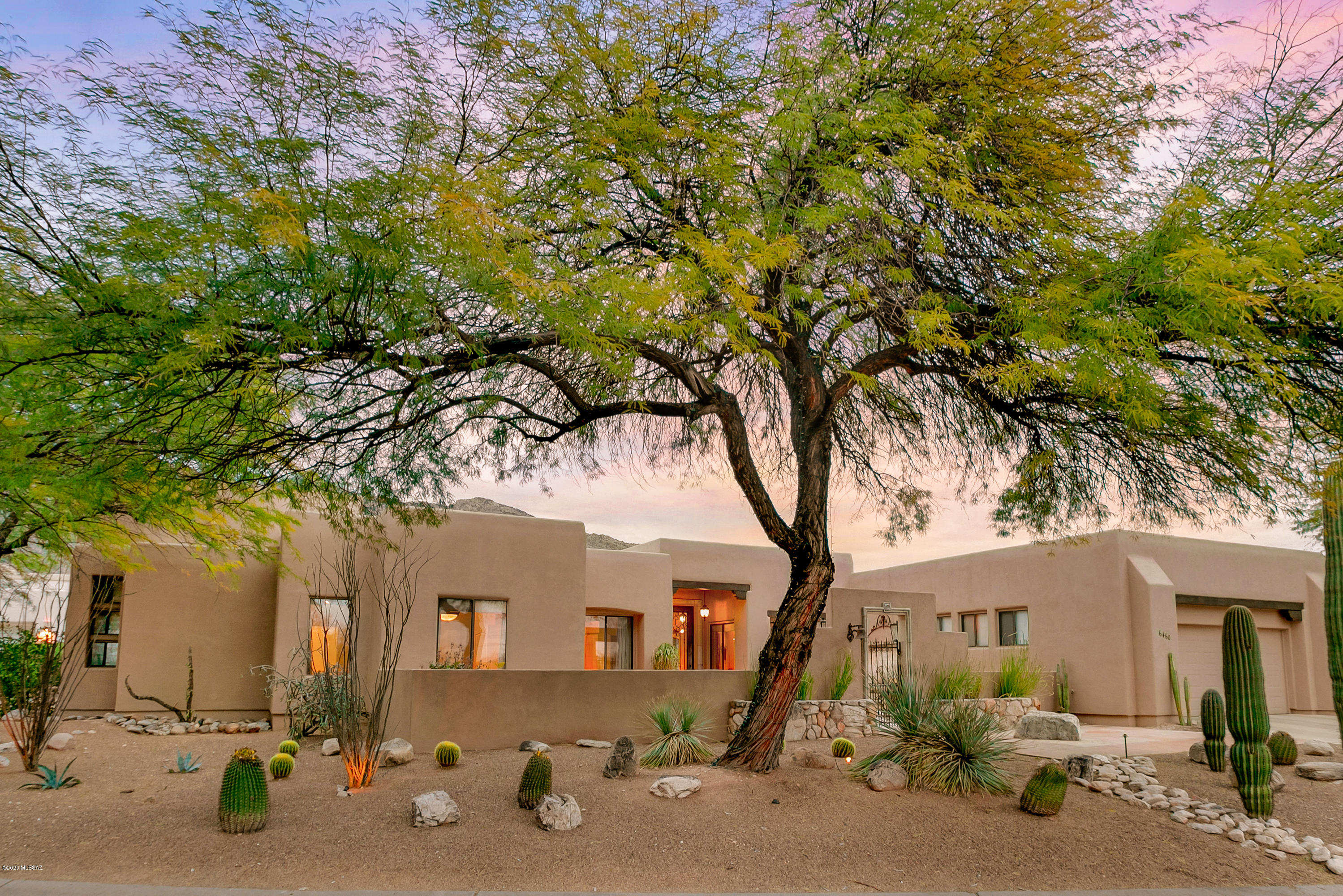 Luxurious finishes & stunning views distinguish this 4bd/4ba Foothills home– travertine floors, limestone counters & elegant lighting & fixtures.  Gourmet kitchen boasts Subzero fridge, Wolf range, double ovens, wine fridge, and custom cabinetry. Rear yard is entertainer's delight w/outdoor kitchen & expansive covered flagstone patio overlooking spacious area w/lap pool, fountains, outdoor shower &  stairway to rooftop deck for panoramic views. Master suite is glorious retreat w/captivating views & en suite bath features soaker tub & steam shower. In separate wing, two generous  bedrooms share Jack & Jill bath.  Bonus guest suite w/private entrance, bath & flex room could be living room w/kitchenette. Private 30 home enclave share 2 acre community park.   Near Ventana CC w/Dist 16 school