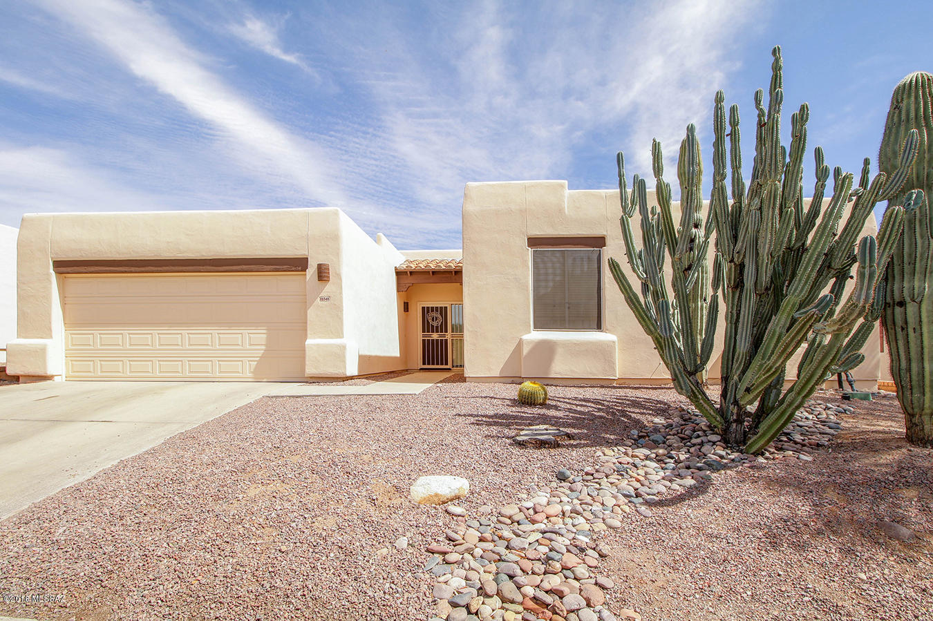 Fantastic 3 bedroom/2 Bath home with Den & 2035 square feet located on a quiet street in a gated community in Oro Valley. No poly piping!! Kitchen, bathrooms, Rheem HVAC & water heater have been updated. New Exterior paint. Kitchen features all new wood cabinets w/2 lazy susans, adjustable shelves, pull out drawers, wastebasket drawer, double side pull out pantry, Quartz countertops, upgraded sink and faucet, garbage disposal, under sink purifier, newer range, SS refrigerator. Bathrooms have new wood cabinets with Quartz counters, newer sinks, newer lighting, toilets, rain head shower head. Newer fans, lighting, insulated garage overhead door. Very private backyard with newer irrigation system. This home is ready for you to move into!!
