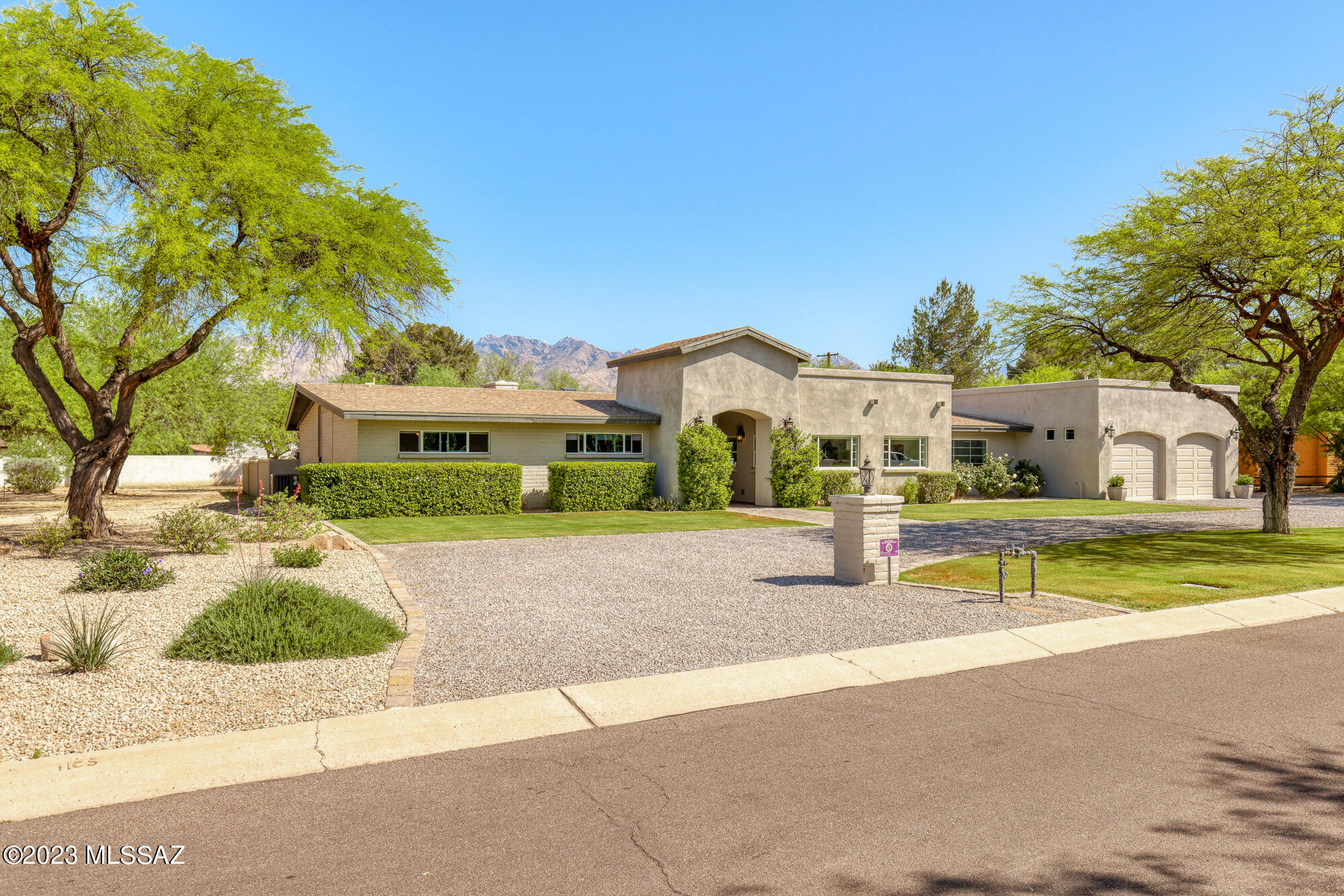 Introducing a contemporary masterpiece in the heart of Tucson Country Club. This stunning home is a perfect blend of modern cutting-edge design & timeless architecture. After a multi year complete top to bottom renovation, this home has not only been re-built to the highest of standards but was also completely re-imagined leaving no detail unfinished. The interior is simple yet elegant, accentuated by clean lines, crisp paint, & beautiful Acacia floors. The chef's kitchen is a dream come true, with modern appliances, beautiful custom cabinetry, and spectacular quartz & concrete countertop.  The primary suite offers a private reading nook & luxurious ensuite bathroom. Outside, you'll enjoy the built in bbq and private pool. And all this in one of Tucson's most sought after neighborhoods.