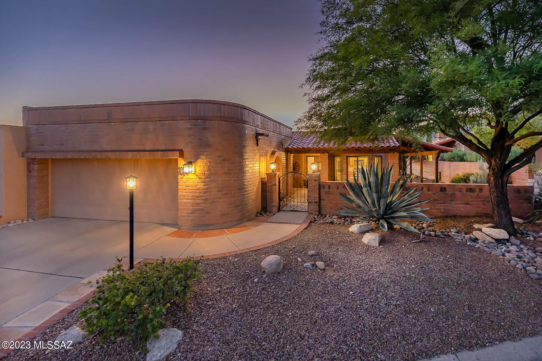 Nestled within the scenic community of Fairfield, this spacious 2,065 sq. ft. home offers a unique blend of modernity and comfort with breathtaking panoramic views of the city and mountains. The property greets you with a meticulously designed front courtyard, inviting you to discover the unmatched views from the side and back covered patios & yard.

Step inside to beautiful modern concrete floors that seamlessly flow throughout the living areas, giving way to plush carpeting in the three restful bedrooms. The primary bath is a haven of luxury, featuring a large shower, striking granite finishes, and newer cabinetry, complemented by built-ins in the oversized walk-in closet.

The kitchen, an aspiring chef's dream, is adorned with top of the line black appliances and gleaming granite countertops, providing the perfect space for culinary exploration. Attention to detail is evident with plantation shutters adorning most windows, high ceilings accented by LED lights, and 8 ft sliders framing the stunning views in the living and dining rooms. Warm up on chilly evenings by the cozy beehive fireplace or enjoy the added convenience of a delightful office nook off the spacious primary bedroom. Whether working or relaxing, you'll find private spaces designed just for you. Beyond the elegance of the home itself, the Fairfield community offers ample amenities for recreation and relaxation, including two pools, two spas, two tennis courts, and a clubhouse. A perfect abode for those seeking a harmonious blend of style and functionality in a setting that captures the essence of natural beauty.