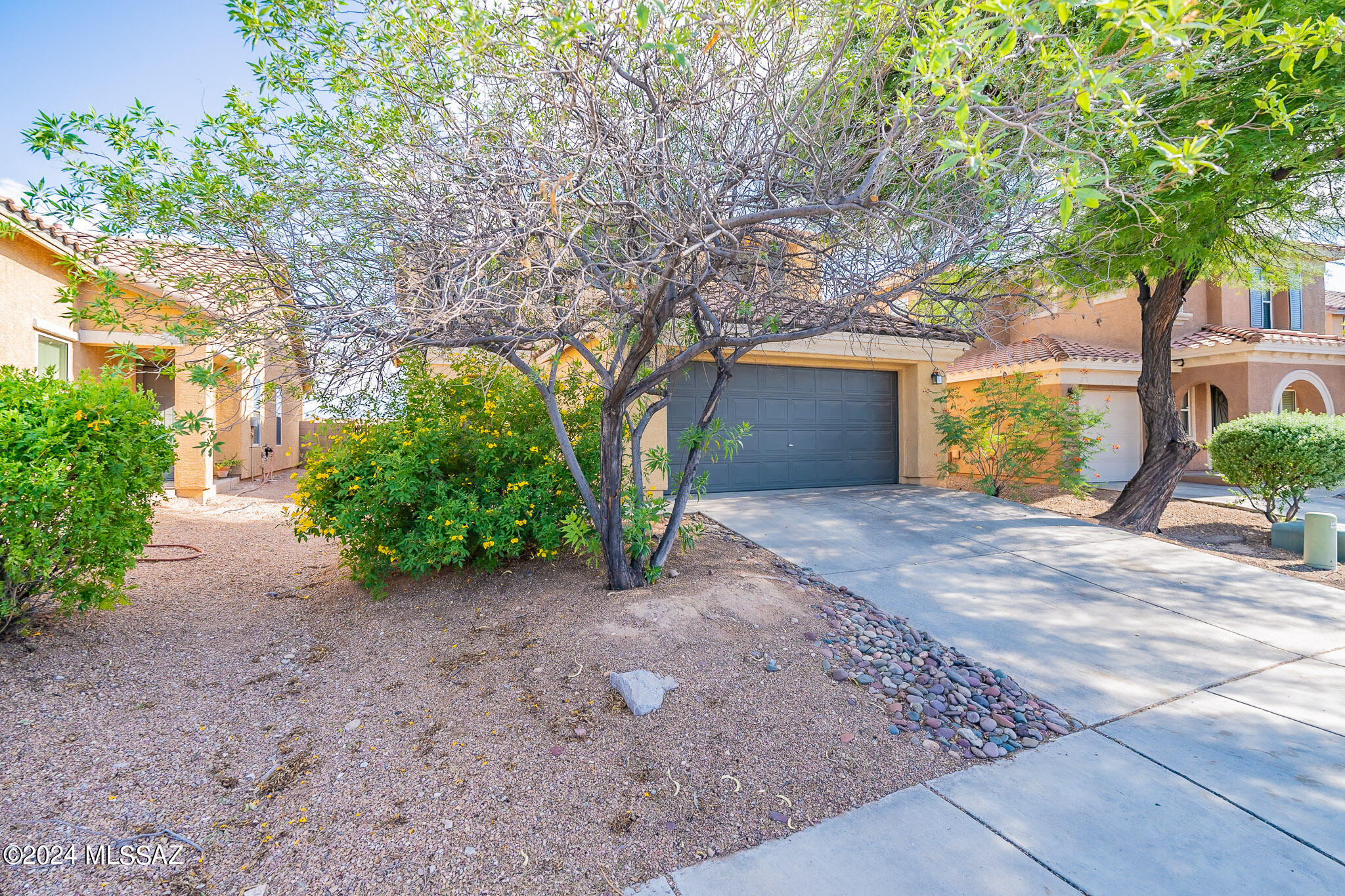 Welcome to this stunning contemporary home located in the desirable Rancho Valencia neighborhood. This spacious three-bedroom, 2.5-bathroom residence offers a perfect blend of modern design and functional living spaces. Close to I-10 for easy commuting. The home features a modern, neutral color palette, providing a clean and inviting atmosphere. Enjoy numerous upgrades throughout the home, enhancing both aesthetics and functionality. Double Ovens are Ideal for cooking and entertaining. and the Breakfast Bar is Perfect for casual dining and socializing. Reduce your  carbon footprint and save on energy costs with the solar power. Enjoy your tankless hot water heat and improved energy efficiency and Ensure clean and purified water throughout your home. Luxury, convenience, and sustainability HVAC system replaced in 2023, tankless water heater in 2024, dishwasher, water filter and double oven are newer.