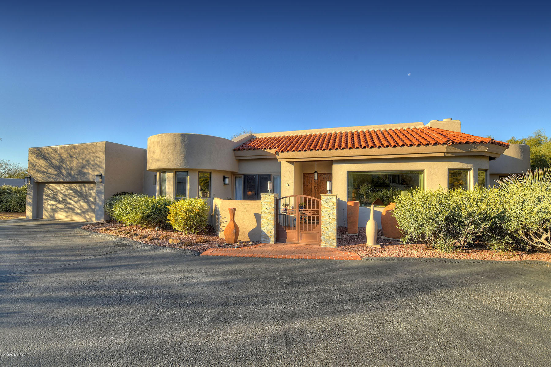 Impeccable Ridge Estates in La Paloma. Home brought down to studs & walls moved for COMPLETE CONTEMPORARY REMODEL. Boasting wood beam ceilings, skylights throughout, porcelain tile, 2 stacked stone fireplaces. Open living & dining rooms, Inviting family room w/ amazing views. Cooks kitchen w/ granite counters, alder cabinets, stainless steel appliances including Subzero fridge, Dacor double ovens, Viking 6 burner gas stove, stainless hood, wine fridge & under cabinet lighting. Bay Window in nook. Luxurious master suite. 2 en-suite guest baths w/ executive height granite counters, glass doors & custom tile work. New Windows. Split floor plan. Perfectly landscaped yard. Covered patio w/ 2 built in BBQ's (gas & charcoal). Welcoming front courtyard. 1 story, no steps.Privacy& Views on .43 acre