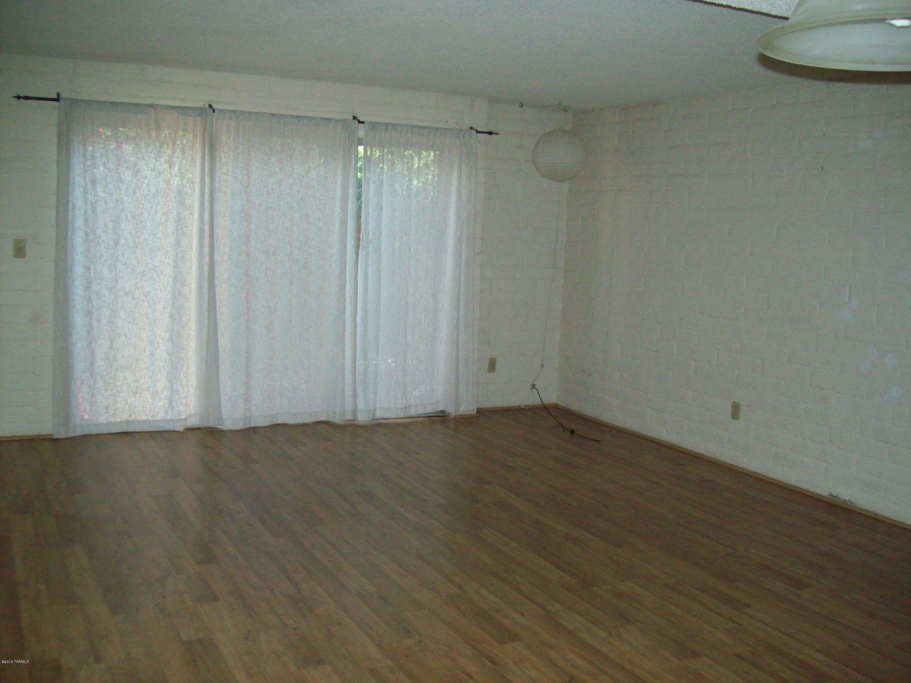 Tucson North Townhome Apts. - Residential Lease