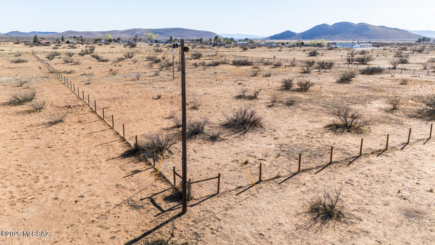 This 4.5-acre corner lot is ready for your dream home, featuring installed septic, power on the property, and brand-new fencing. Nestled at over 4,000 feet in elevation, enjoy cooler summers and breathtaking views of the Chiricahua Mountains. The area is known for its stunning dark skies, making it a perfect spot for stargazing and Milky Way views. Whether you're looking for a peaceful country retreat or the ideal place to build a retirement home, this property offers privacy while still being conveniently located. With easy access and endless possibilities, this is a rare opportunity to own a piece of Arizona's beautiful high desert landscape. Old well on property. Buyer to determine well's usability.  Don't miss out on this prime piece of land!