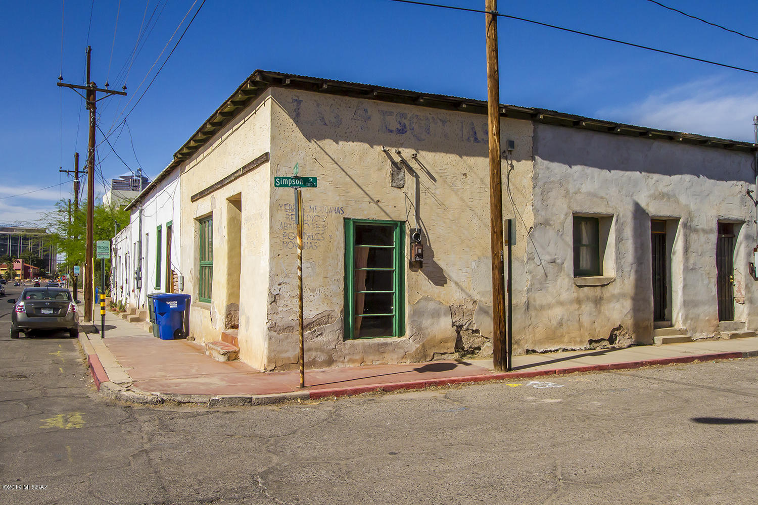 Las Cuatras Esquinas has been in the same family for over 40 years. This is the first time that it is on the market. An 1886 map shows buildings at all four corners of South Convent and West Simpson — a grocery, a store, a dwelling and one vacant structure. Just two years later, three of the four corners housed stores or groceries. Horse and buggy is what delivered the groceries! Legend has it that gold is buried in the basement of the market. There have been many attempts to find it to no avail. This is now one of the rare, large properties of the Barrio. 10 units are used as rentals and 2 are used for storage. The development possibilities are interesting or would make a fabulous Family Compound!