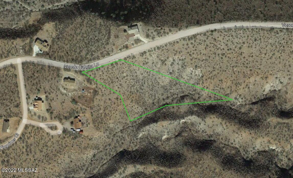 OWNER WILL CARRY with only $4,000 down on this wonderful 2.69 acre parcel close to Pendleton and I-19.  Very usable, great views, paved road, water and electric in the street. Lots of room to build! Terms negotiable.