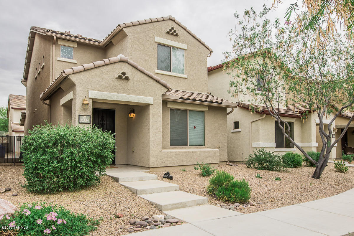 What a fantastic home! With 2 large bedrooms, 2.5 baths, a 2-car garage, solar water heater and super low energy costs you will fall in love with this home’s easy care and convenience. Have the best of all worlds, easy care home and a community center for swimming, jogging/walking paths, and lovely views. There is a fantastic master bath with huge master closet. Laundry is upstairs for your convenience. Both bedrooms are newly painted; also, some painting has been done downstairs. This home has been well loved, and is a happy home. The carpets are freshly cleaned. New and lovely flooring installed in the kitchen and baths. Want to know the best part about this home, the loan is assumable! REALLY!  Want to know more, give a call; please, don’t miss out on this great opportunity!!