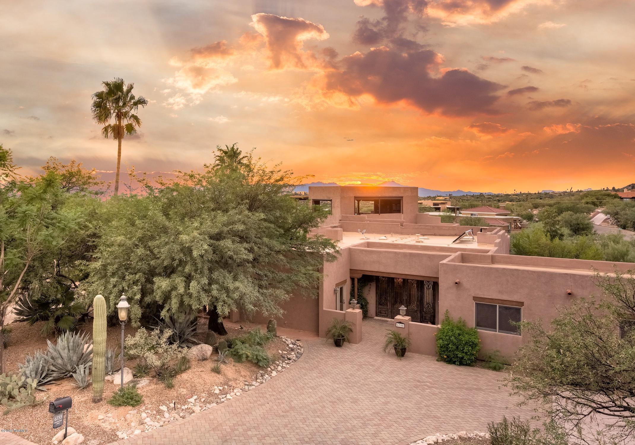 Stunning Foothills Home at the base of the Santa Catalina Mountains....Gated Skyline Country Club. Fully remodeled 5BDRM/4BA home...Chef's kitchen with family room, both pool side & great for entertaining. Formal Dining & Living rooms with mountain views & adjacent private patio...professional home office...outdoor great room with city/mountain  views...large 3 car garage. Full Skyline Country Club Membership included with the purchase (subject to membership approval by the Skyline Country Club go to www.skylinecountryclub.com).