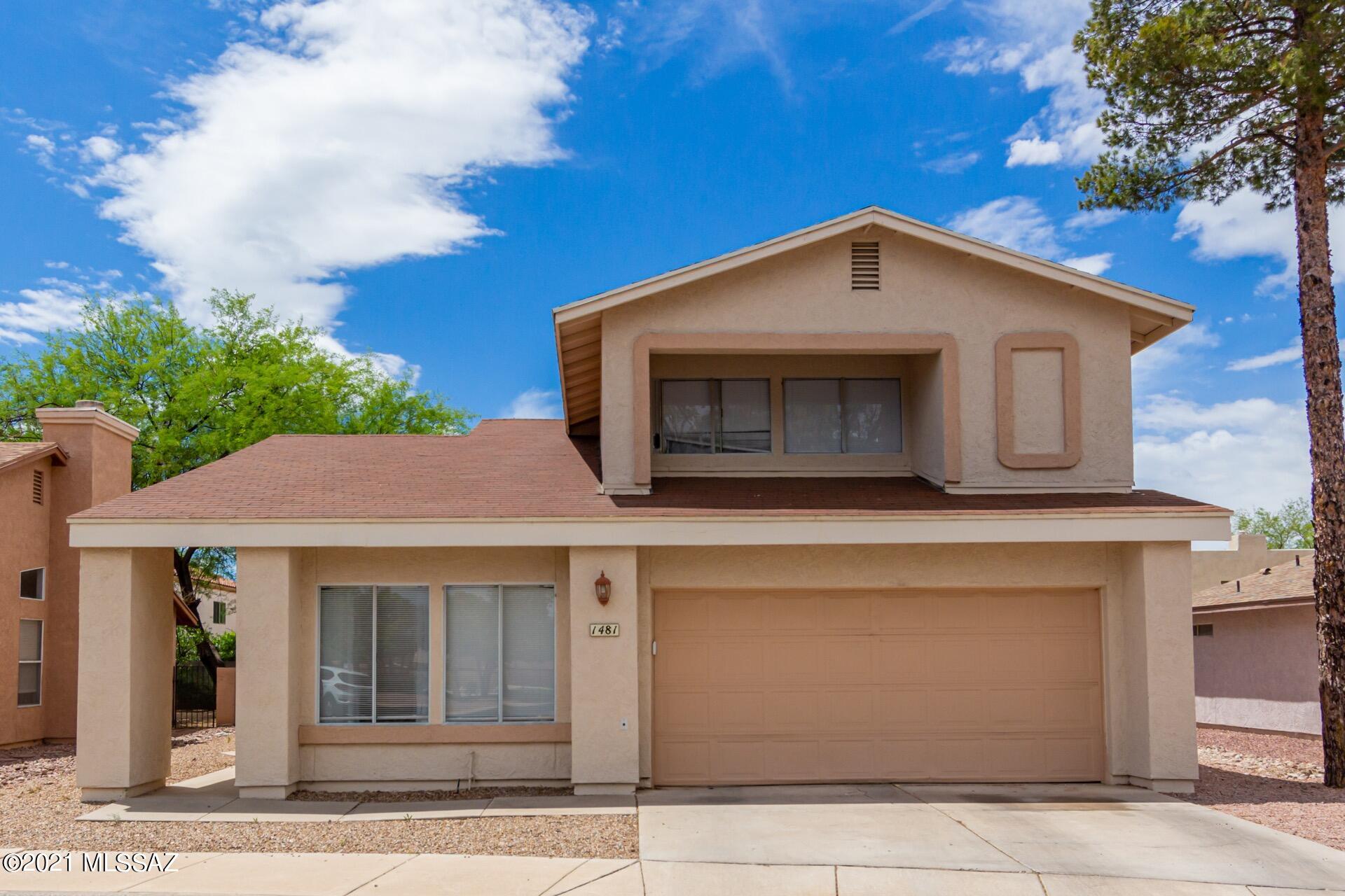 Charming two story home with soaring ceilings, neutral palette, compliments wood ''look'' tile floors, window shades, ceiling fans, & a family room fireplace with patio access. Granite kitchen counters, tile backsplash, & plethora of wood cabinetry with raised panel doors. French doors to patio from the dining room. Plush carpet on the stairway. Generous size bedrooms, ample closets, upgraded baths with granite counters, & laundry area in garage. Extended covered patio, shade trees, & room for a pool. Vast Mountain views! Community Pool. Don't miss out this incredible home!
