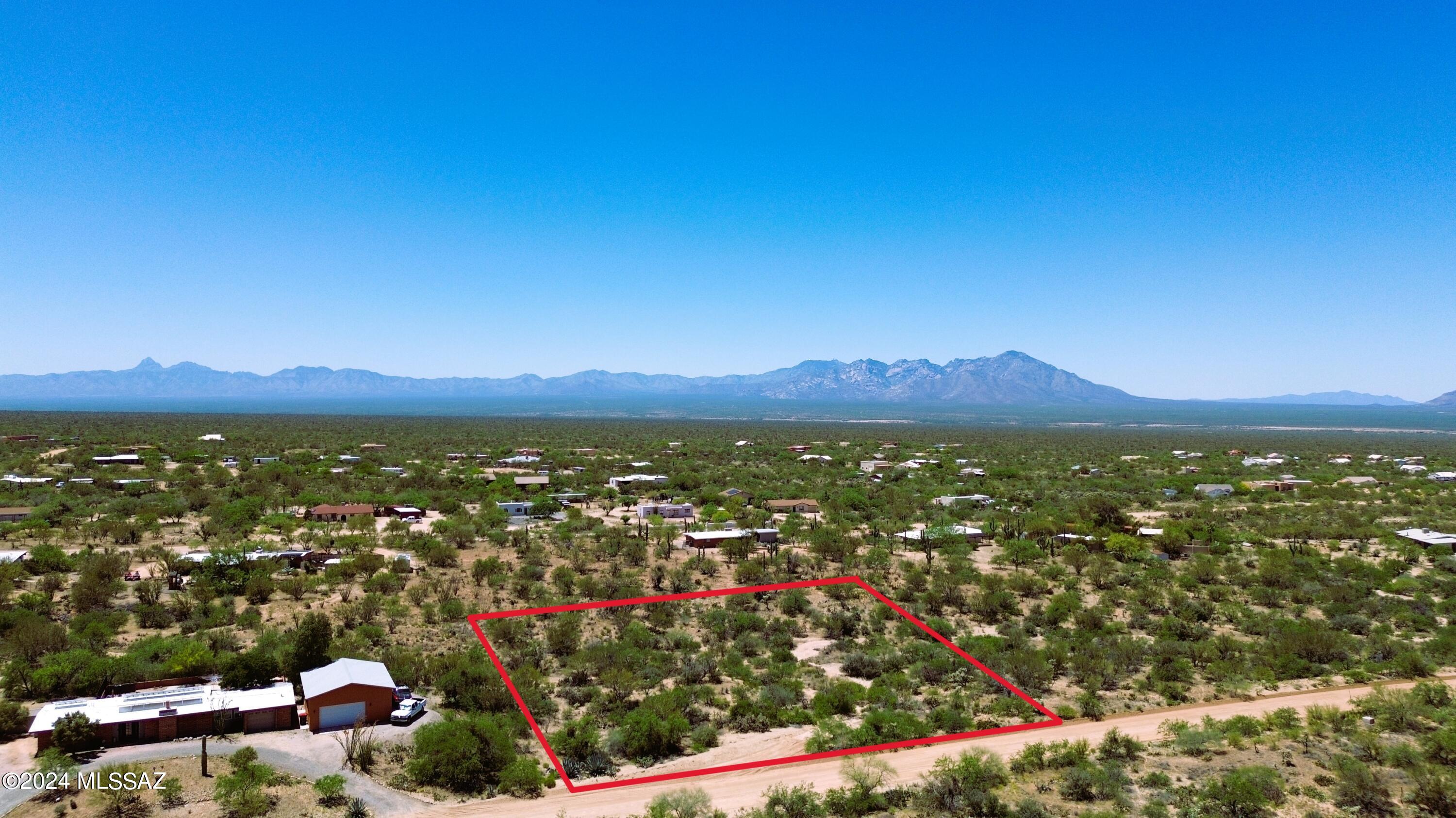 Lot 18 in Diamond Bell Ranch unit 9 for sale !! Discover the hidden gem of Diamond Bell Ranch, where Tucson's charm meets Southern Arizona's allure. Embrace breathtaking vistas of Kitt Peak and the Baboquivari Mountains. Here lies your canvas to craft your dream abode, atop this premium large 1.4-acre lot. Benefit from nearby underground utilities. County-maintained roads ensure accessibility. Amidst a neighborhood adorned with custom homes, pride of ownership radiates, with the freedom to accommodate horses. Don't miss the opportunity to seize this beautiful lot, where space for both your home and cherished animals awaits. Take the first step towards making your dream.. From vibrant sunrises to tranquil sunsets, and the mesmerizing spectacle of starlit skies, Diamond Bell Ranch offers a lifestyle unlike any other. Come experience the allure of Diamond Bell Ranch today!