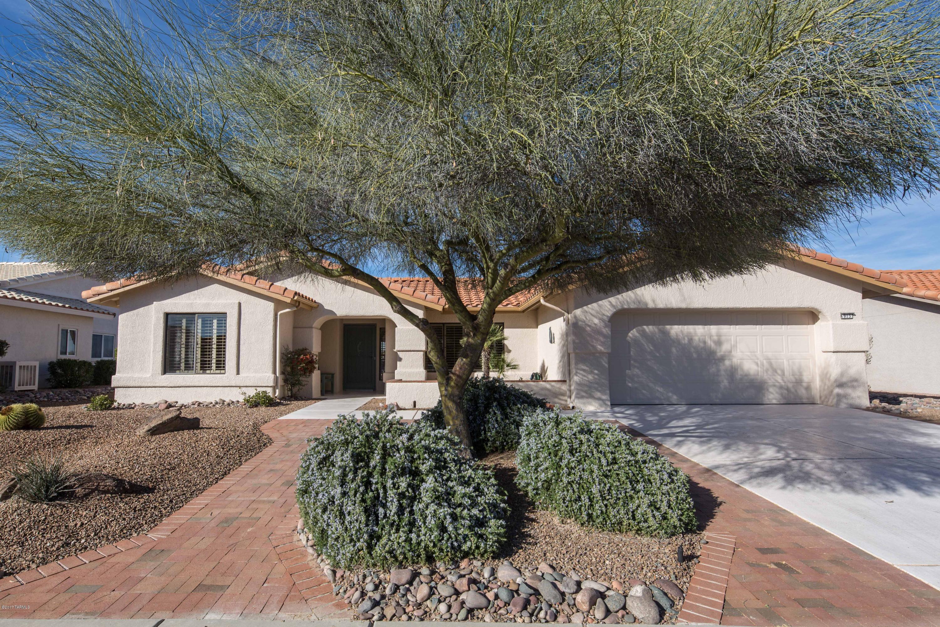 Lovely 2 bedroom plus Den AND Sunroom, Tortolita Model.  Backs to open space/ wildlife corridor with fabulous views and privacy!  Brand new kitchen appliances, freshly painted exterior.  Great garage with built in storage.  Bay windows in Den and in Master Bedroom.  Plantation Shutters and lots of tile, make this the perfect Arizona house.  Large brick paver patio in backyard to enjoy your morning coffee or alfresco dinner.  Move-in Ready! Click on Photos Tab for Virtual Tour & 360 Interactive Virtual Tour!