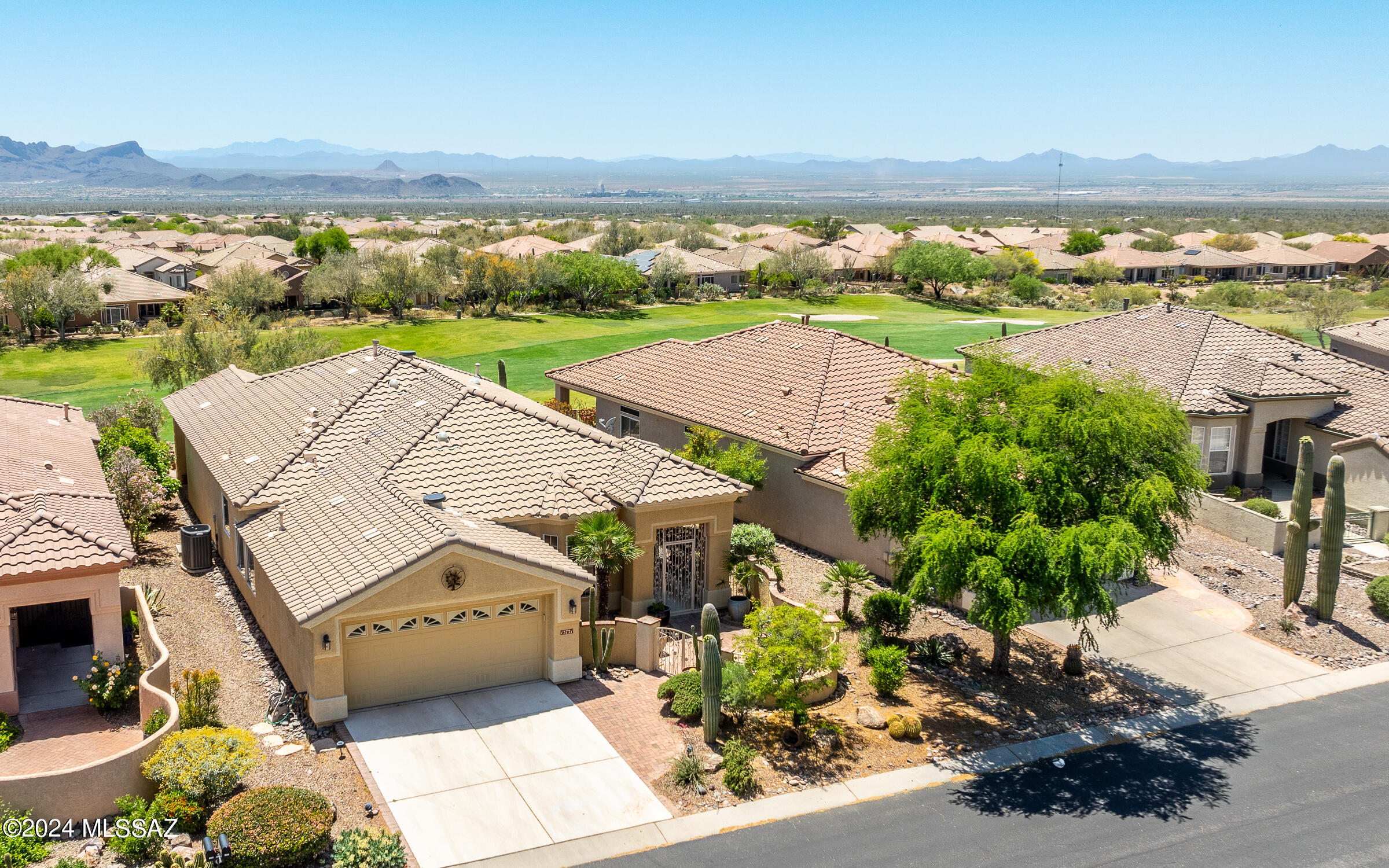 THE BEST PANORAMIC VIEWS IN THE COMMUNITY. City, Mountain, Golf Course, Desert. EXTENDED MEDFORD floor plan; 2130 Sq Ft; 2BR/2BA + DEN w/2 Car Garage. Perched high on a raised lot. - YOU HAVE GOT TO SEE THIS TO BELIEVE IT. Entertainer's Kitchen w/Granite Counter Tops. Custom Wood Cabinetry w/Showcase Glass Cabinet and All SS Appliances Included. Living Room, Formal Dining Room. DEN w/Murphy BED/Desk System. Extended Guest Bedroom w/Updated Guest Bath. Large Owner's Suite w/Slider to