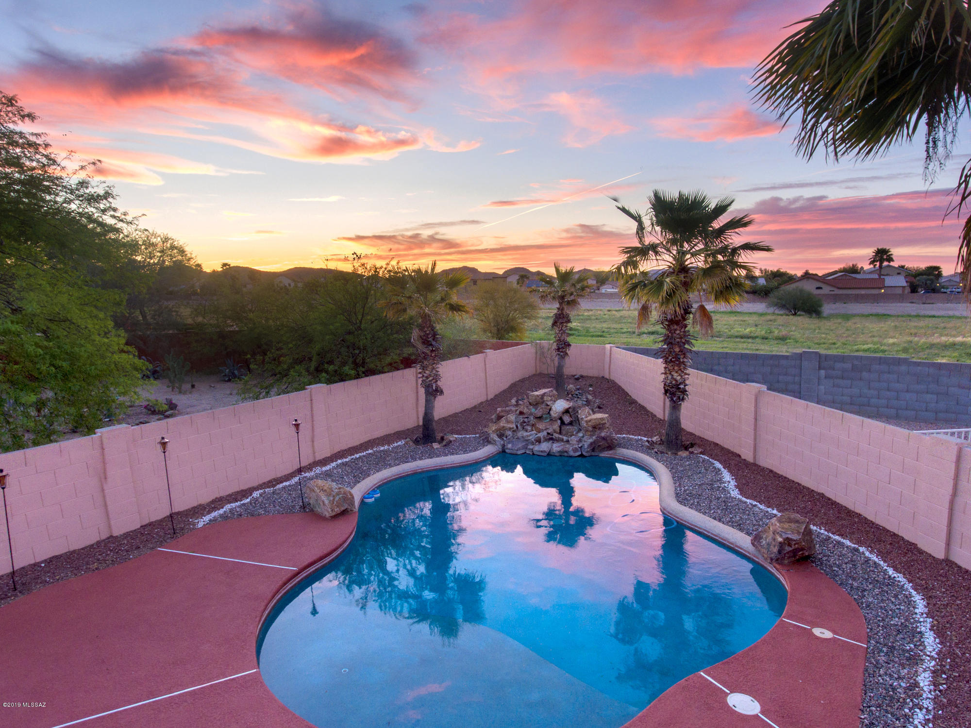 This tastefully remodeled home sits on a quiet cul-de-sac, and features granite counter tops, stainless steel appliances, brand new floors and carpet. 

It features a comfortable and private back yard entertainment area with a covered patio, lots of play space, a large shed, mature citrus, and a refreshing pool with a natural rock water feature. Furthermore, enjoy all the amenities offered to you in Continental Ranch (pools, splash pads + more).

3 MINUTE WALK TO THE LOOP - CONTINENTAL RANCH AMENITIES: HEATED POOL - SOCCER FIELD - TENNIS - SKATE PARK, BATTING CAGES AND EVERYTHING YOU NEED TO KEEP YOU AND YOUR LITTLE CHAMPIONS HAPPY

If you appreciate excellent aesthetics, high functionality and expansive back yard views that reveal the beauty of Southern AZ, then welcome home.